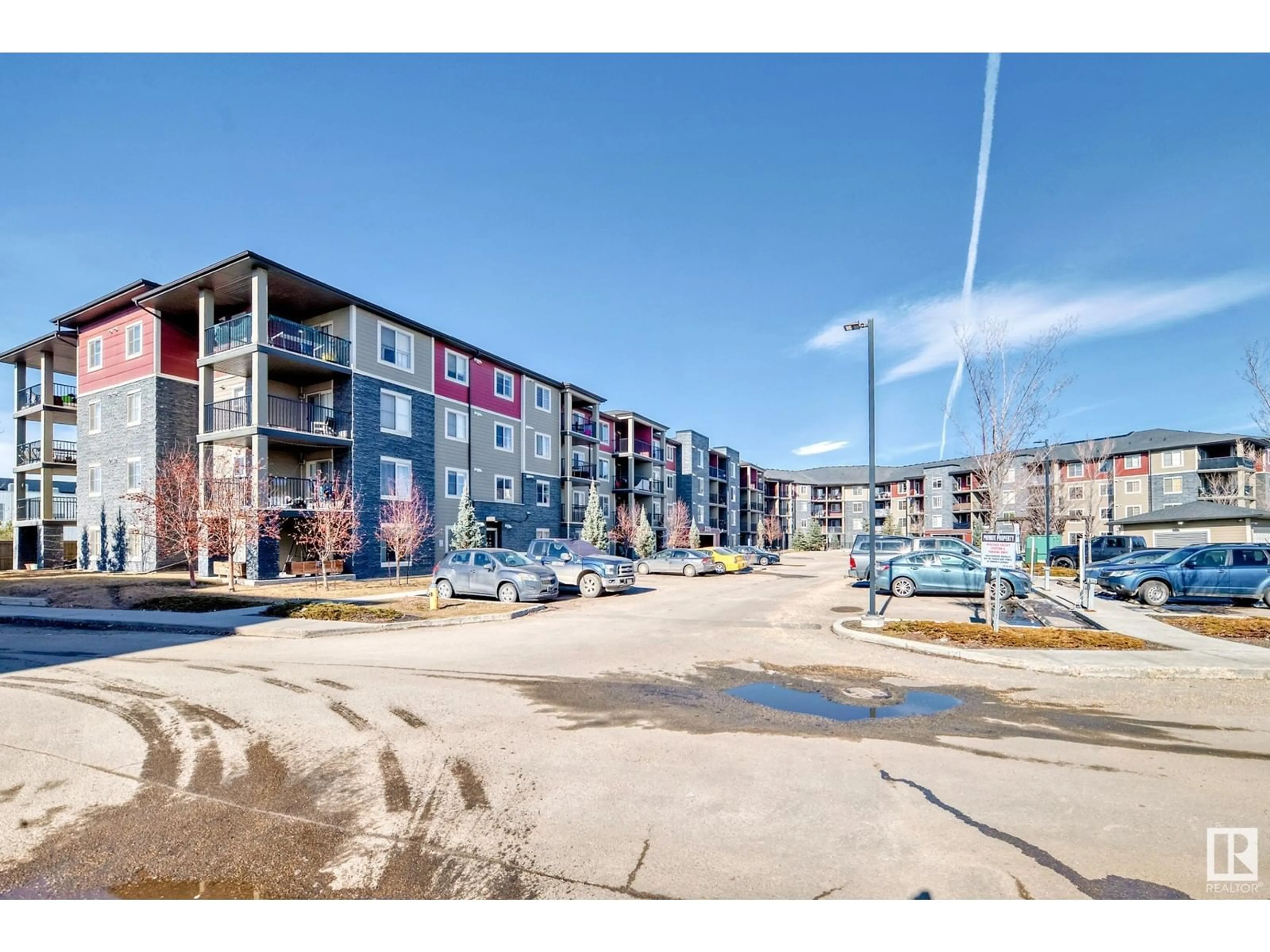 A pic from outside/outdoor area/front of a property/back of a property/a pic from drone, street for 418 - 3315 JAMES MOWATT TR, Edmonton Alberta T6W3L9