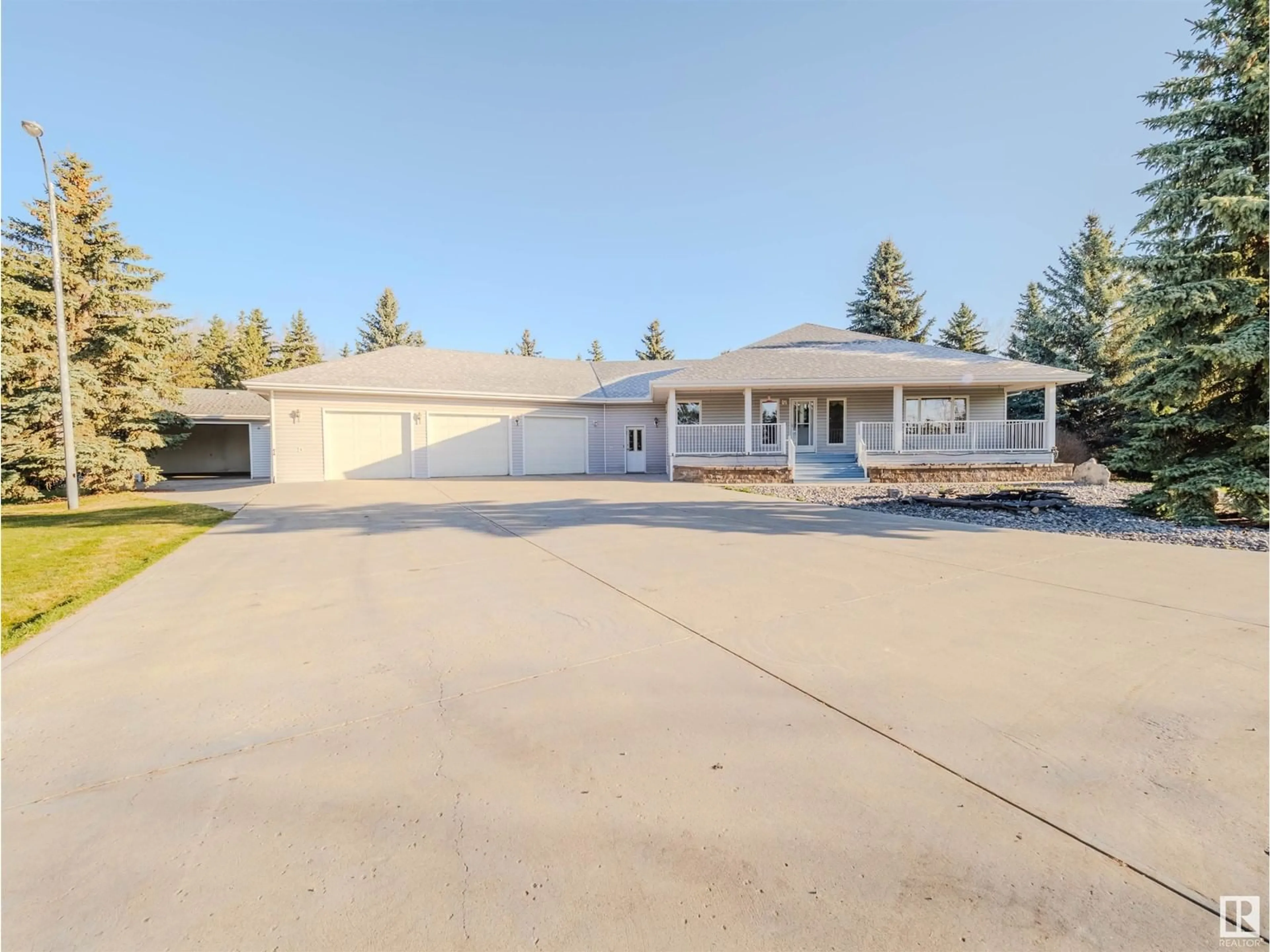 A pic from outside/outdoor area/front of a property/back of a property/a pic from drone, street for 25415 - 29 HWY 37, Rural Sturgeon County Alberta T8T0C6