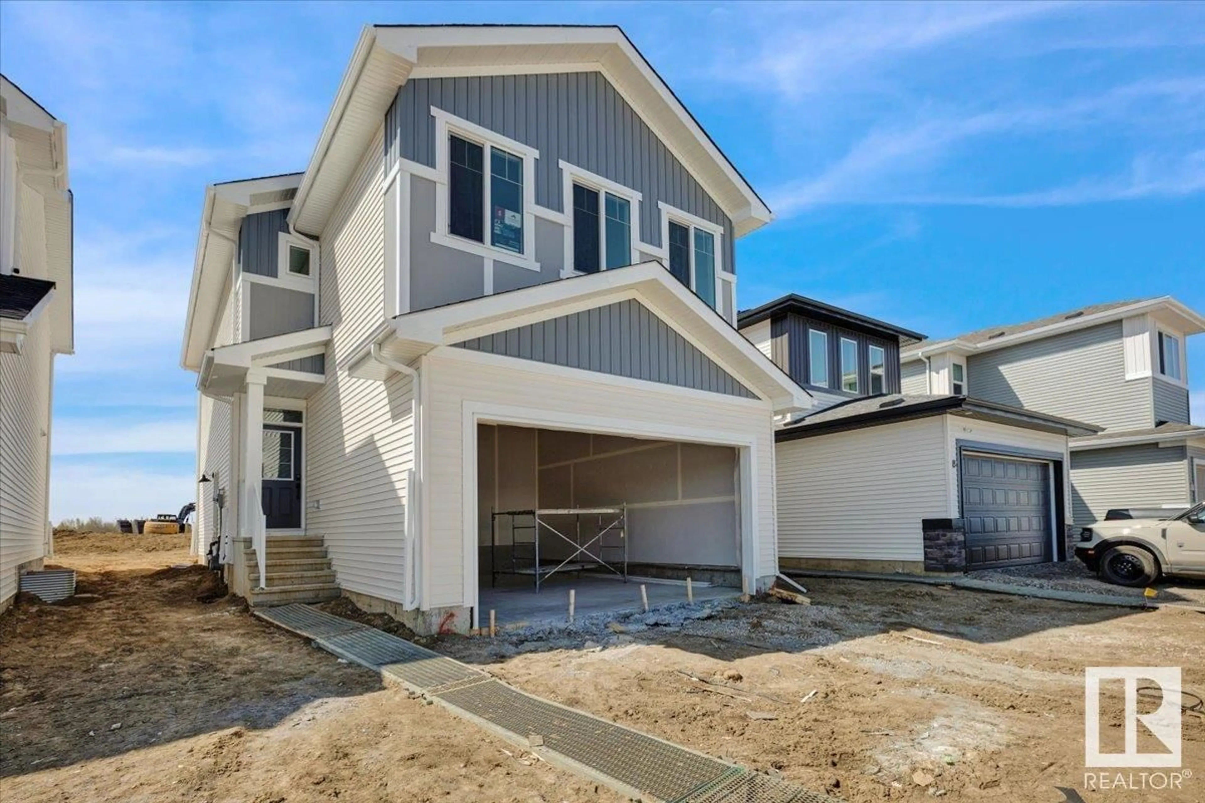Home with vinyl exterior material, street for 6 BRICKYARD WY, Stony Plain Alberta T7Z0H9