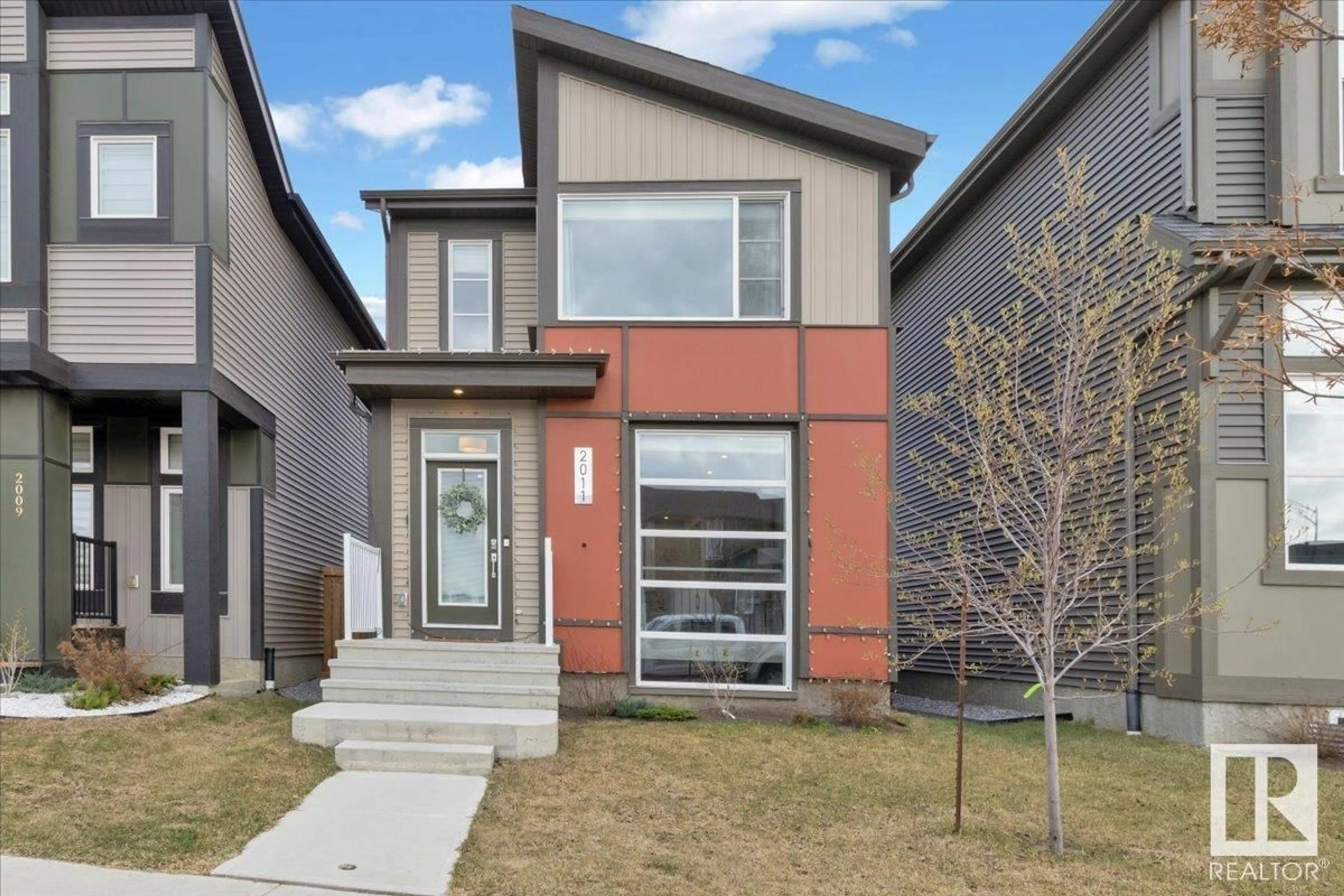 Home with brick exterior material, street for 2011 DESROCHERS DR, Edmonton Alberta T6W4Y7