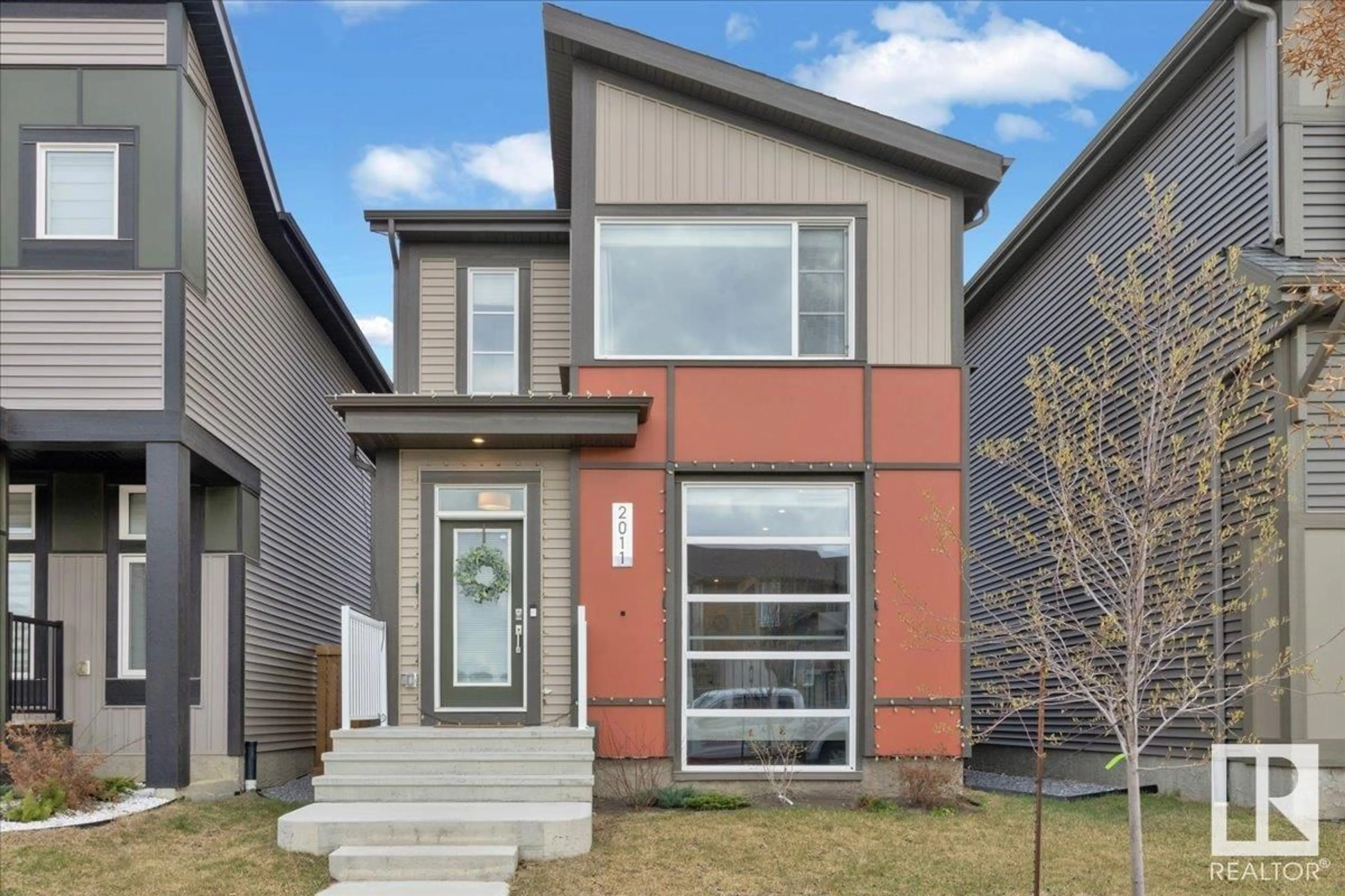 Home with vinyl exterior material, street for 2011 DESROCHERS DR, Edmonton Alberta T6W4Y7