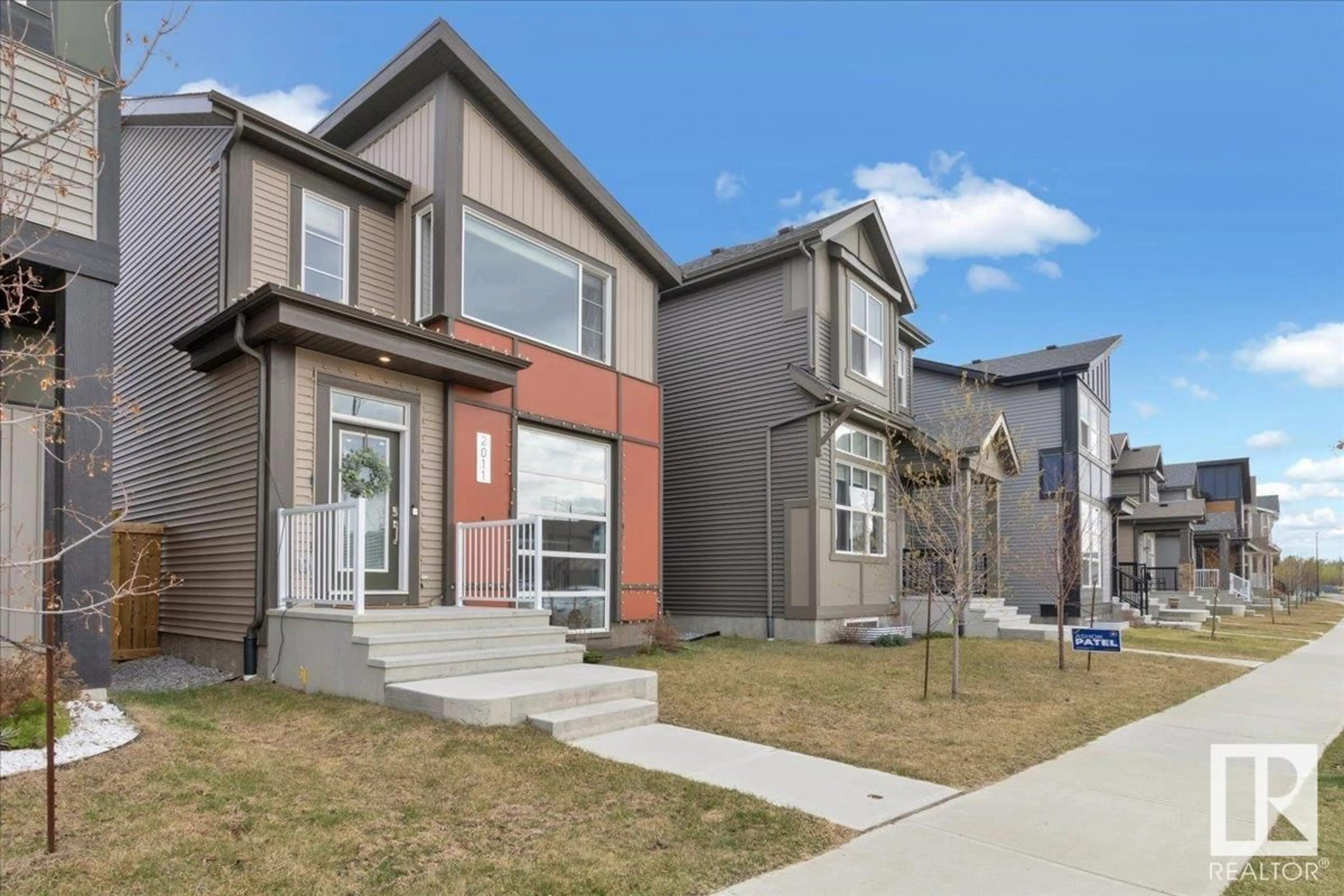 Home with brick exterior material, street for 2011 DESROCHERS DR, Edmonton Alberta T6W4Y7