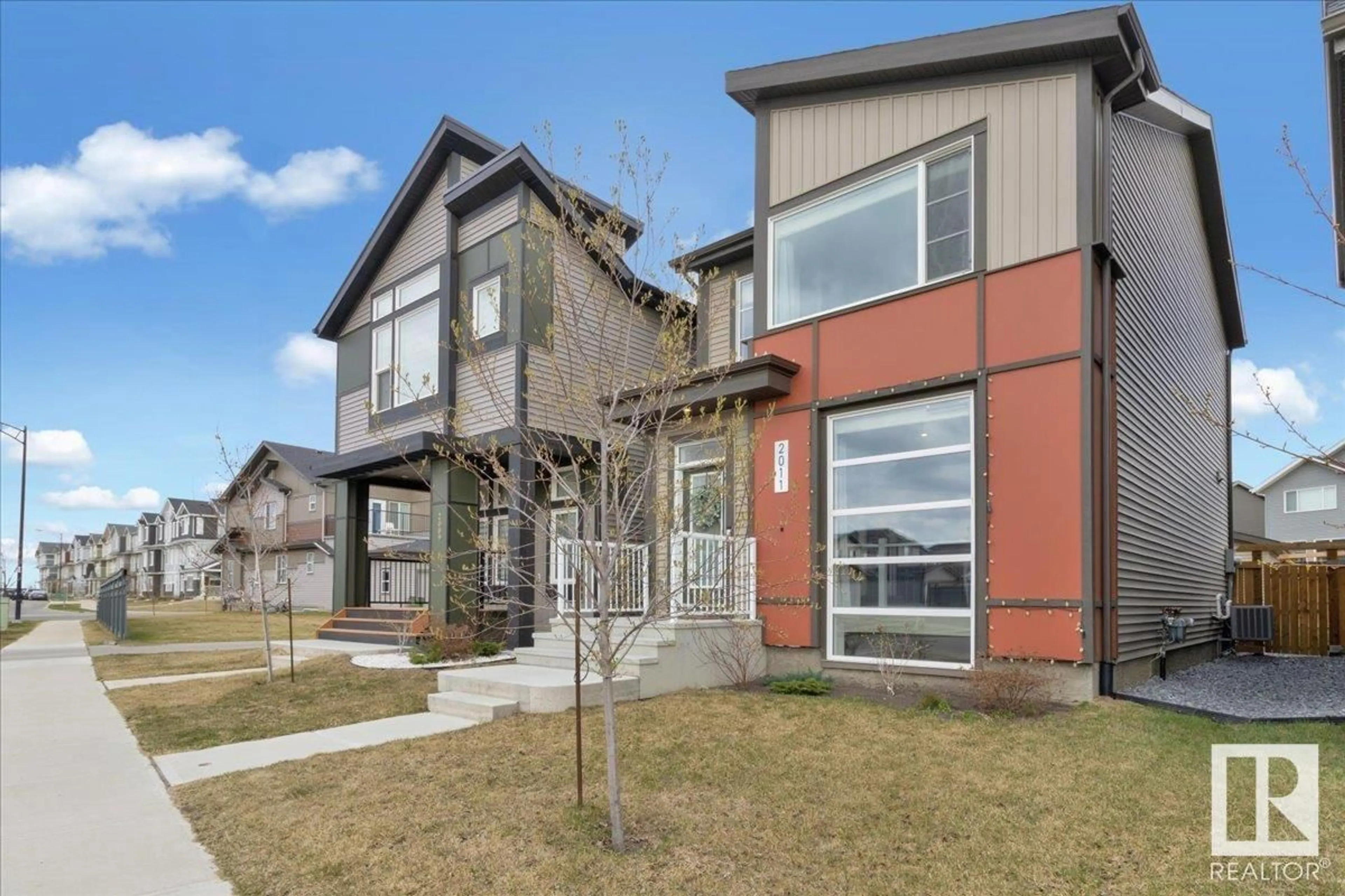 Home with brick exterior material, street for 2011 DESROCHERS DR, Edmonton Alberta T6W4Y7