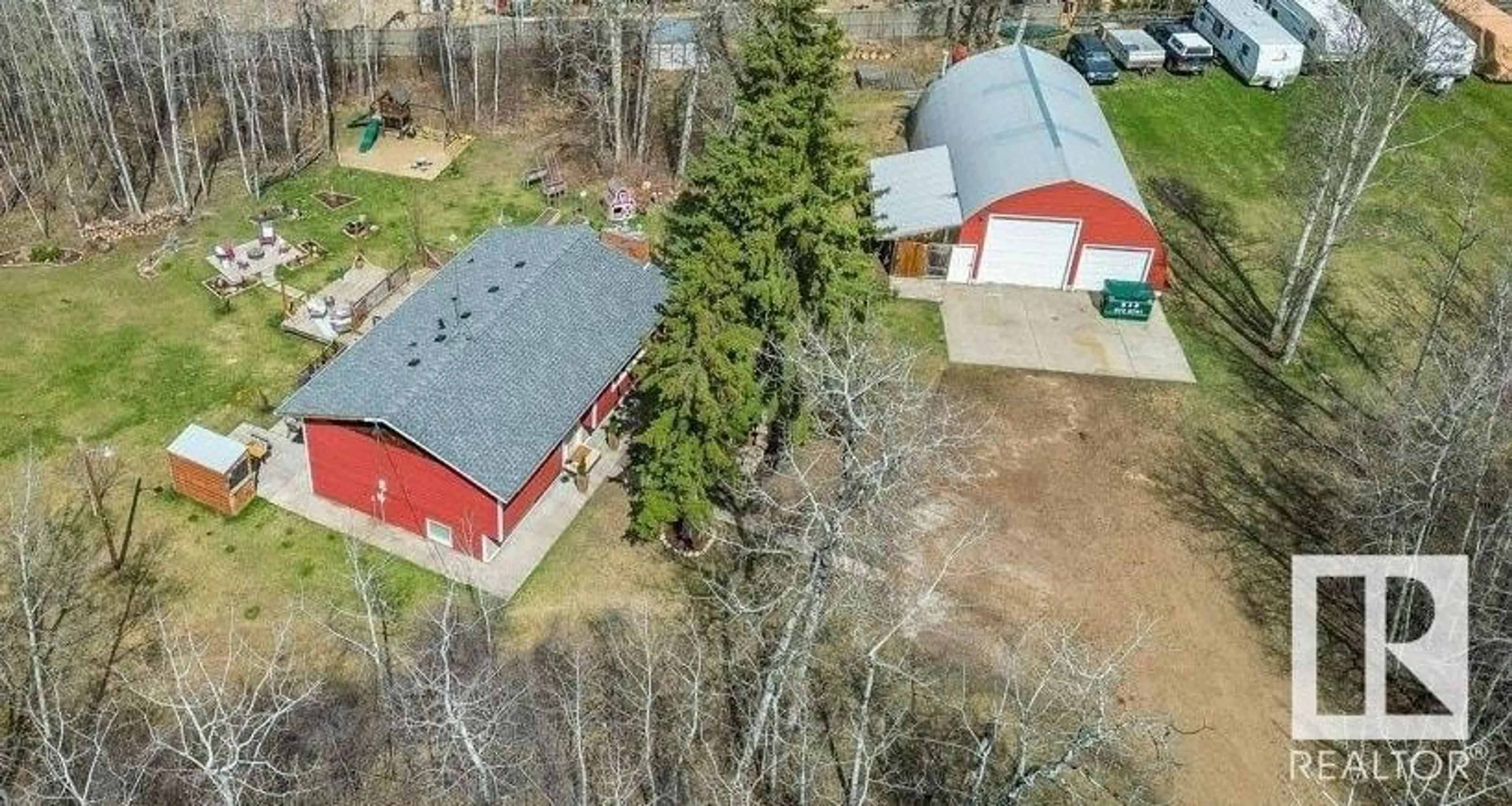 A pic from outside/outdoor area/front of a property/back of a property/a pic from drone, building for 253 - 51110 RANGE ROAD 214, Rural Strathcona County Alberta T8E1G7