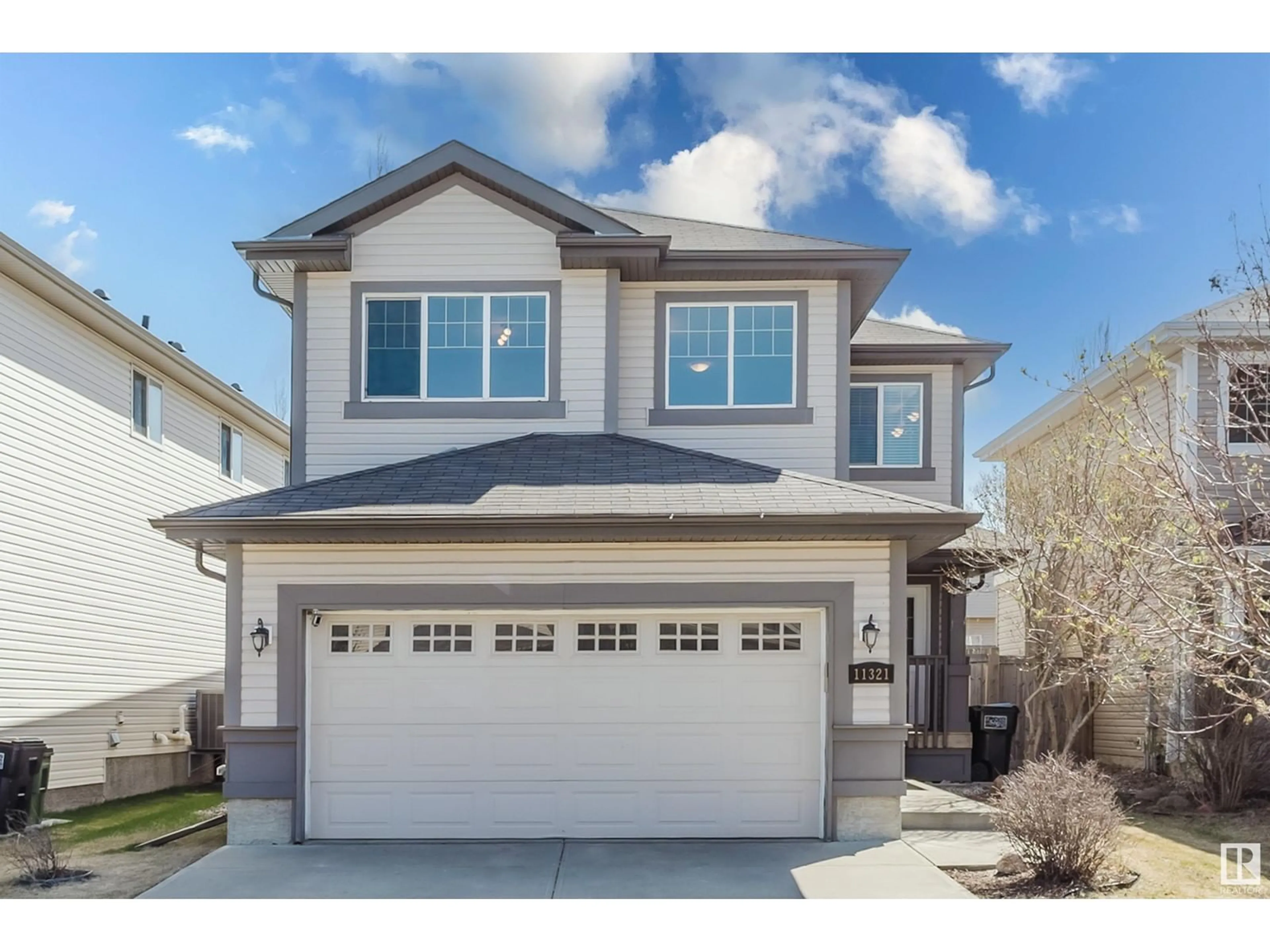 Home with vinyl exterior material, street for SW - 11321 13A AV, Edmonton Alberta T6W0G9
