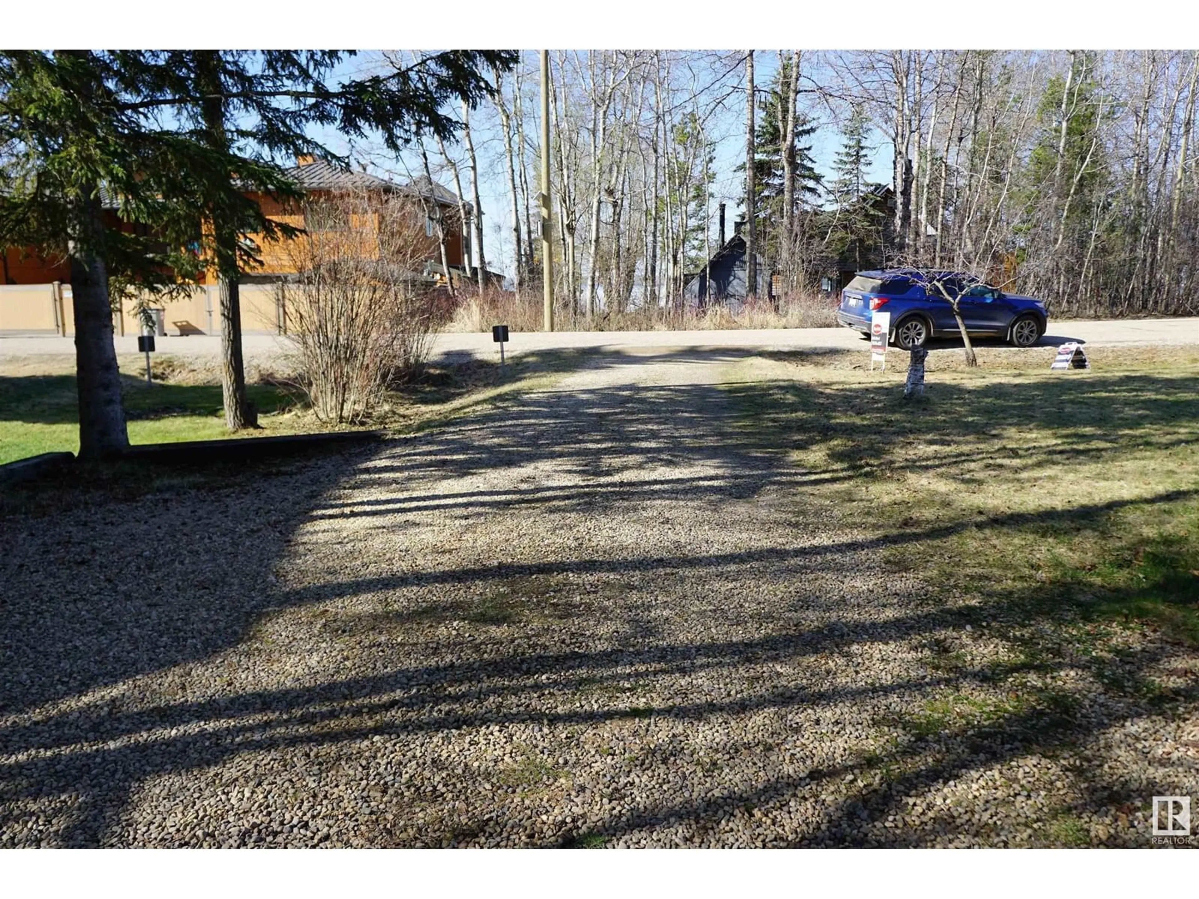 A pic from outside/outdoor area/front of a property/back of a property/a pic from drone, unknown for B17 JOHNSONIA BE, Rural Leduc County Alberta T0C2P0