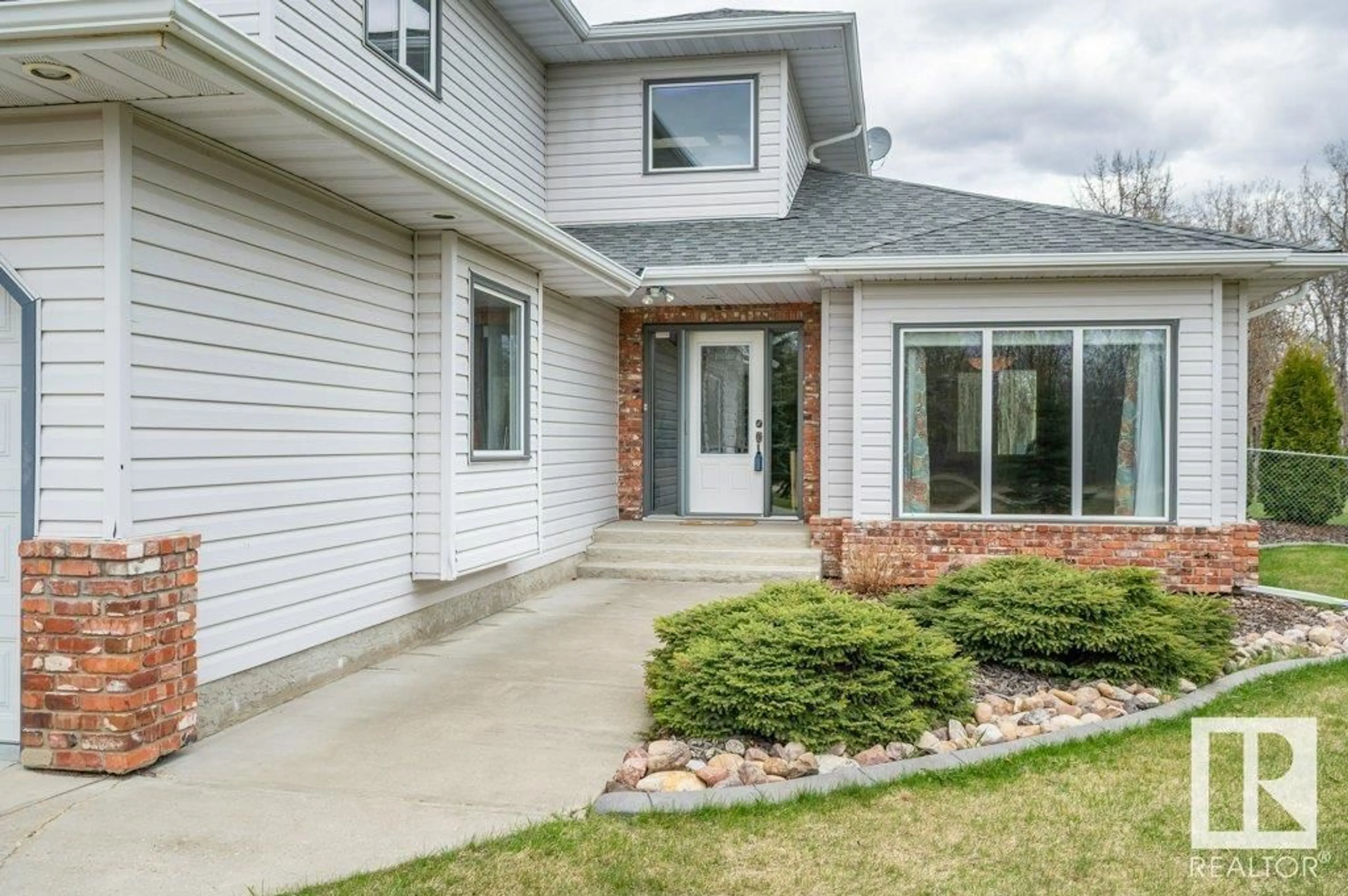 Home with brick exterior material, street for 52368 - 86 RANGE ROAD 223, Rural Strathcona County Alberta T8C1B4