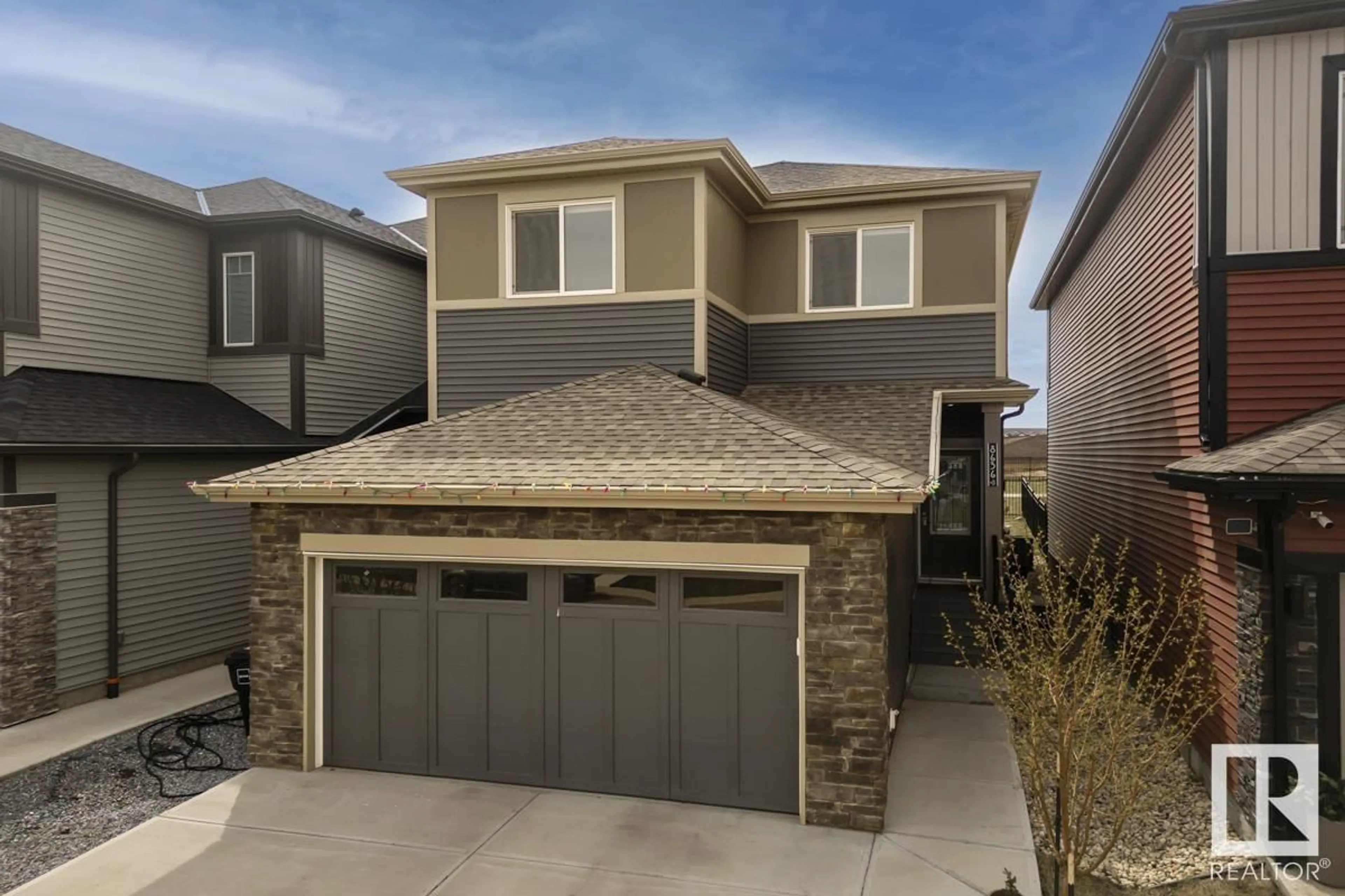 Home with vinyl exterior material, street for 8636 223 ST NW, Edmonton Alberta T5T7L6