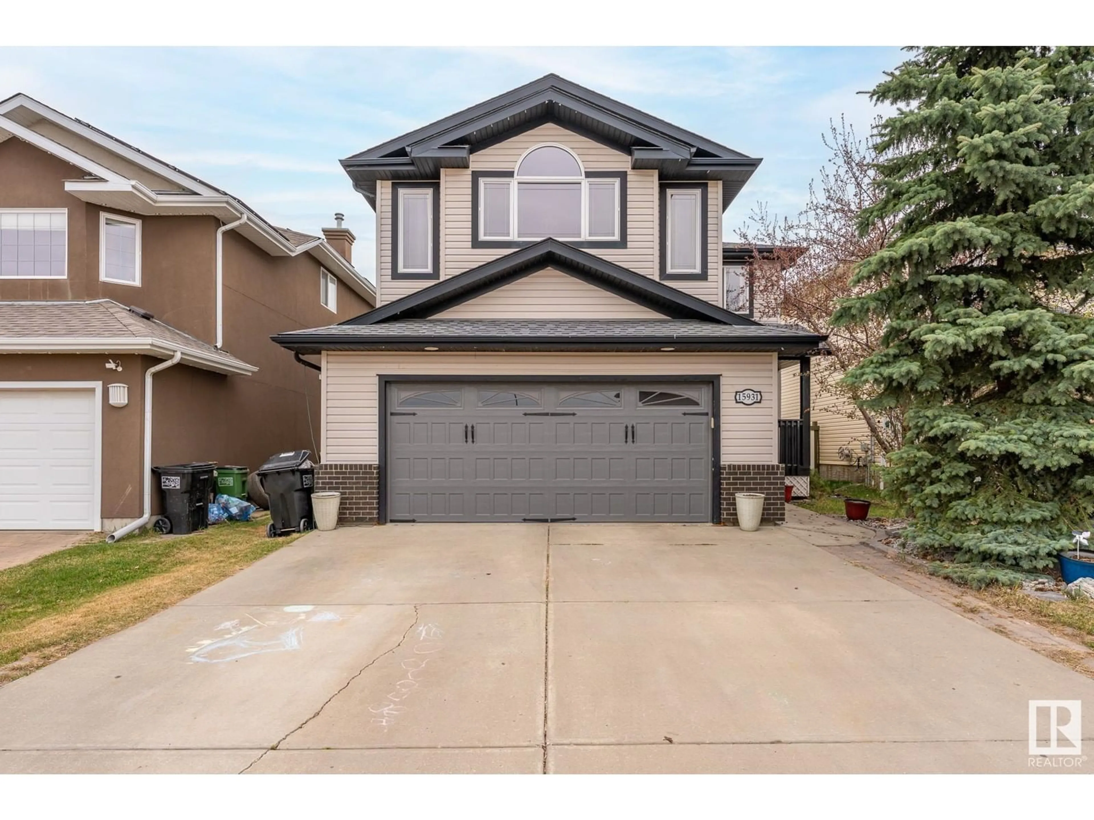 Home with vinyl exterior material, street for 15931 134 ST NW, Edmonton Alberta T6V1W9