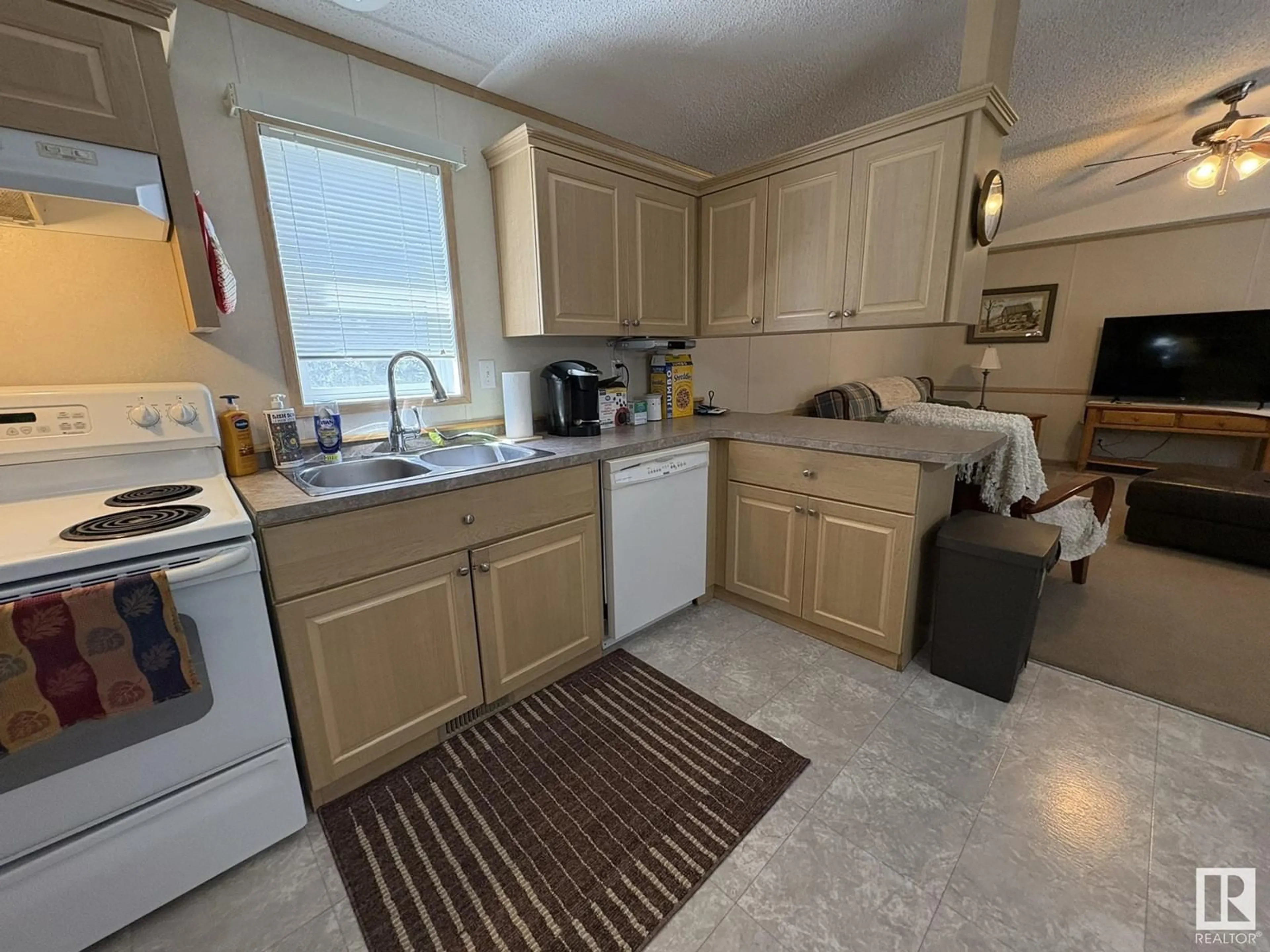 Standard kitchen, ceramic/tile floor for E - 4424 MARIA DR, Smoky Lake Town Alberta T0A3C0
