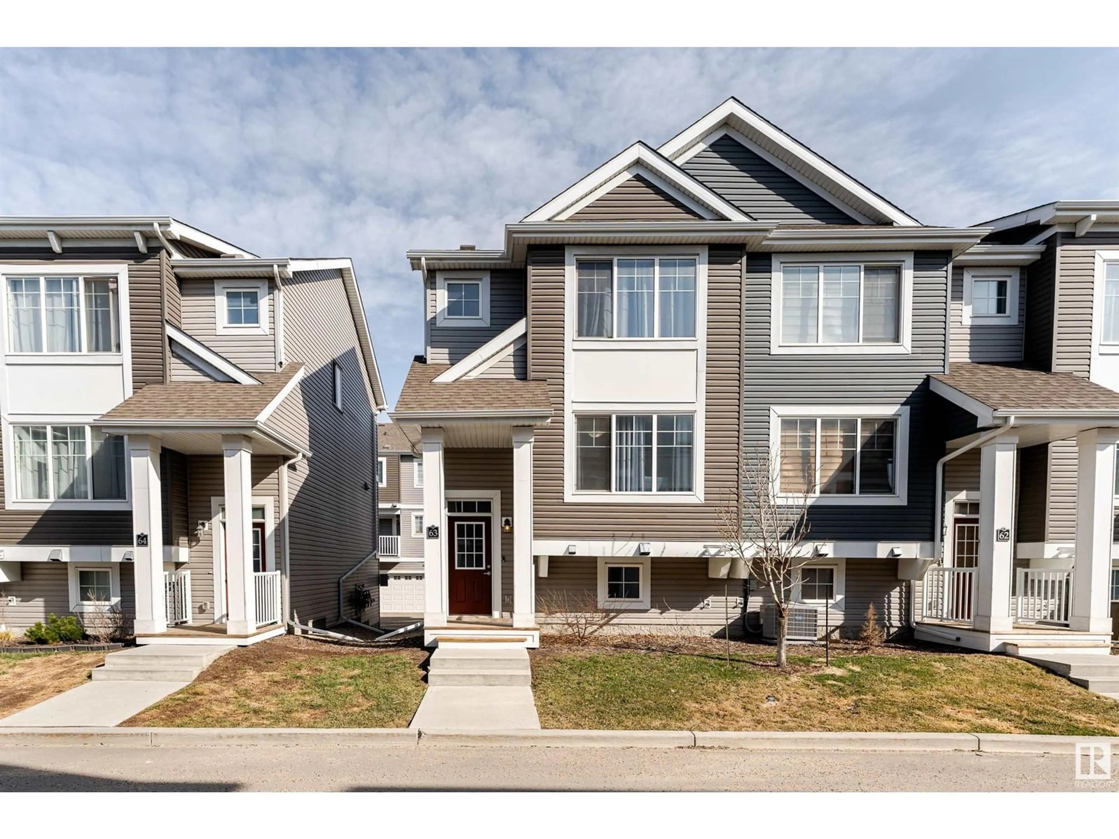 Home with vinyl exterior material, street for #63 - 1391 STARLING DR, Edmonton Alberta T5S0L3