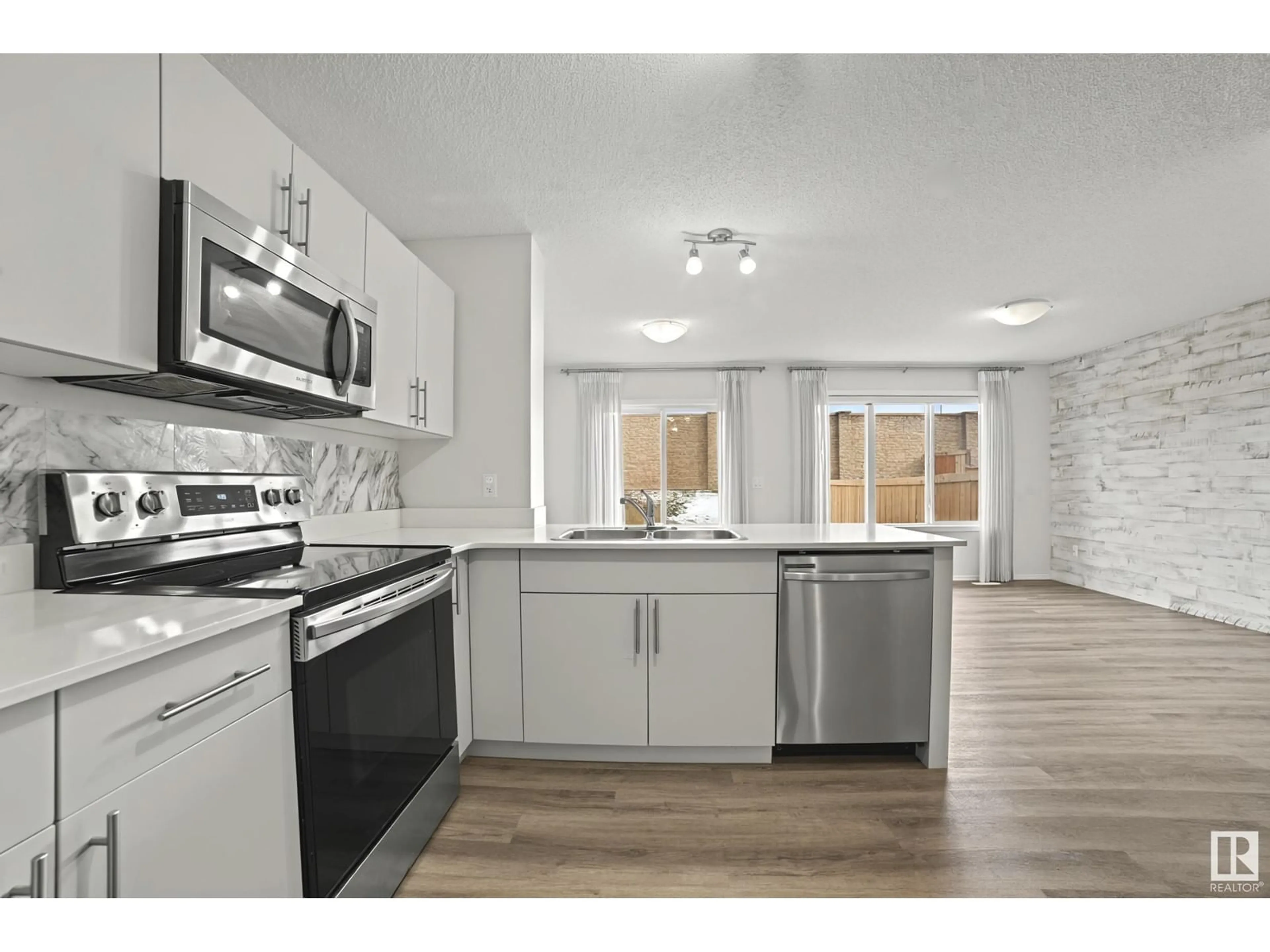 Open concept kitchen, unknown for 3099 CHECKNITA WY, Edmonton Alberta T6W4E9