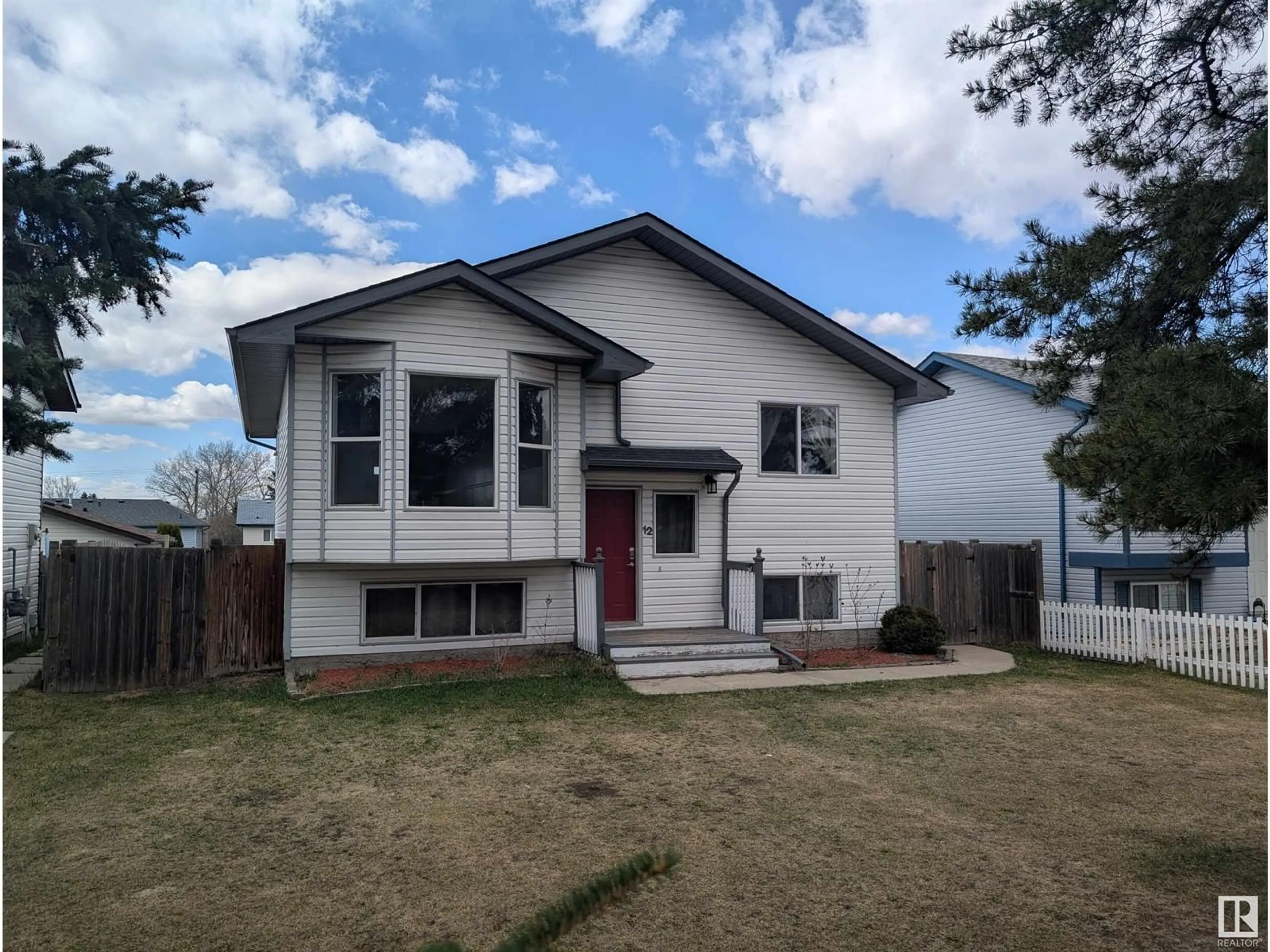 Home with vinyl exterior material, street for 12 SPRUCE MEADOW LN, Bon Accord Alberta T0A0K0
