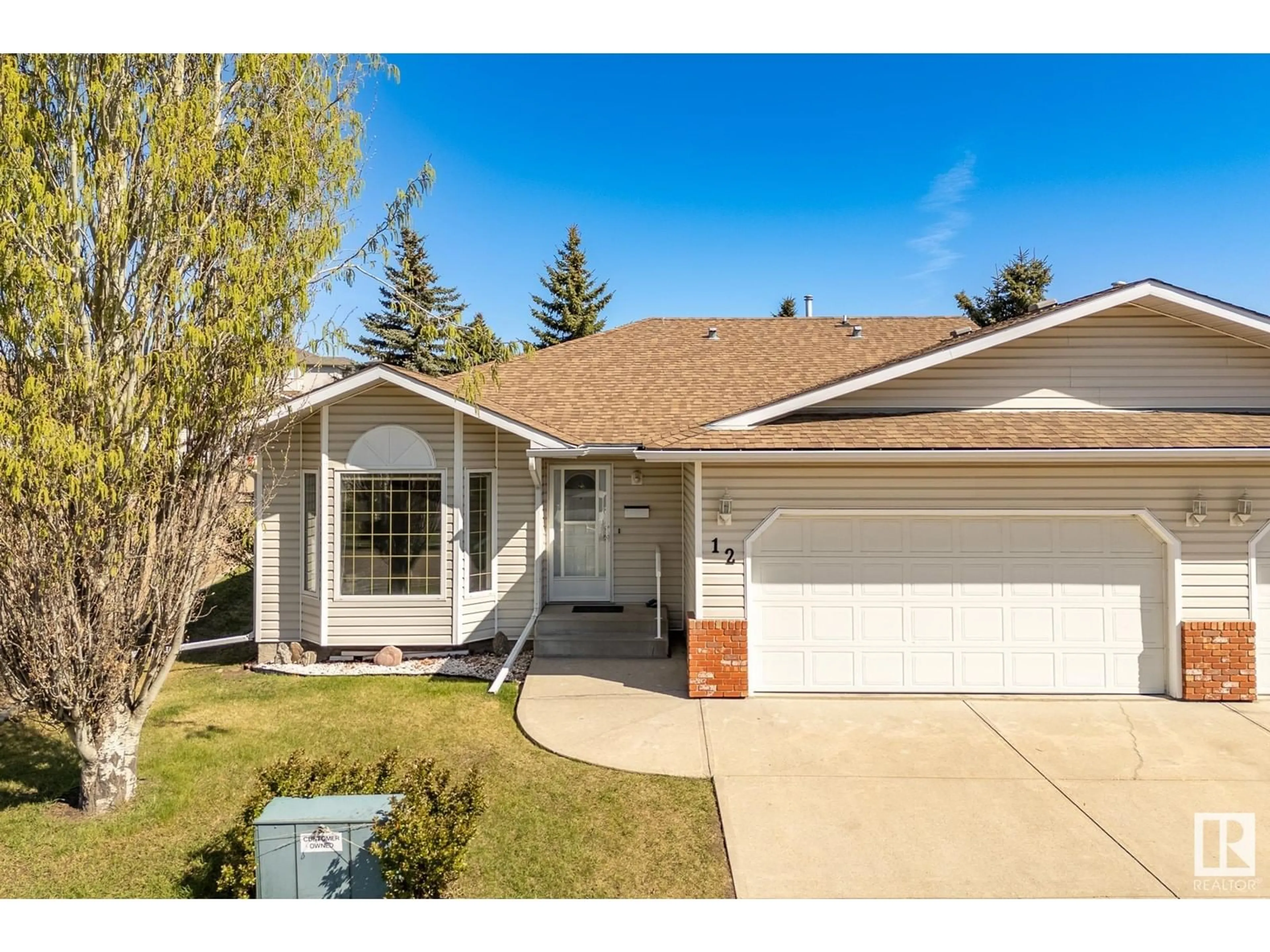 Home with vinyl exterior material, street for 7 - 12 CRANFORD WY, Sherwood Park Alberta T8H5W5