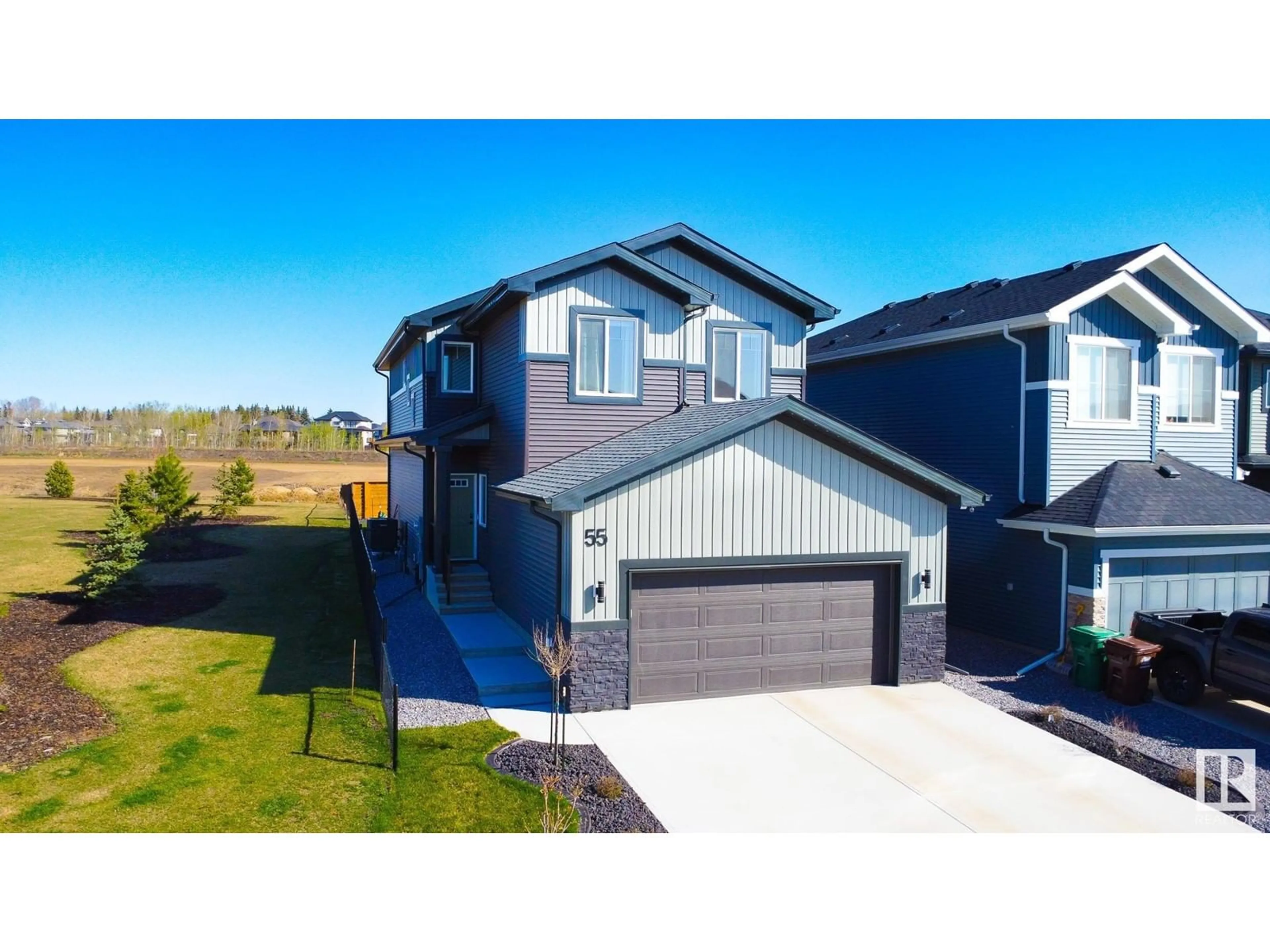 A pic from outside/outdoor area/front of a property/back of a property/a pic from drone, street for 55 RASPBERRY RD, St. Albert Alberta T8N8A3
