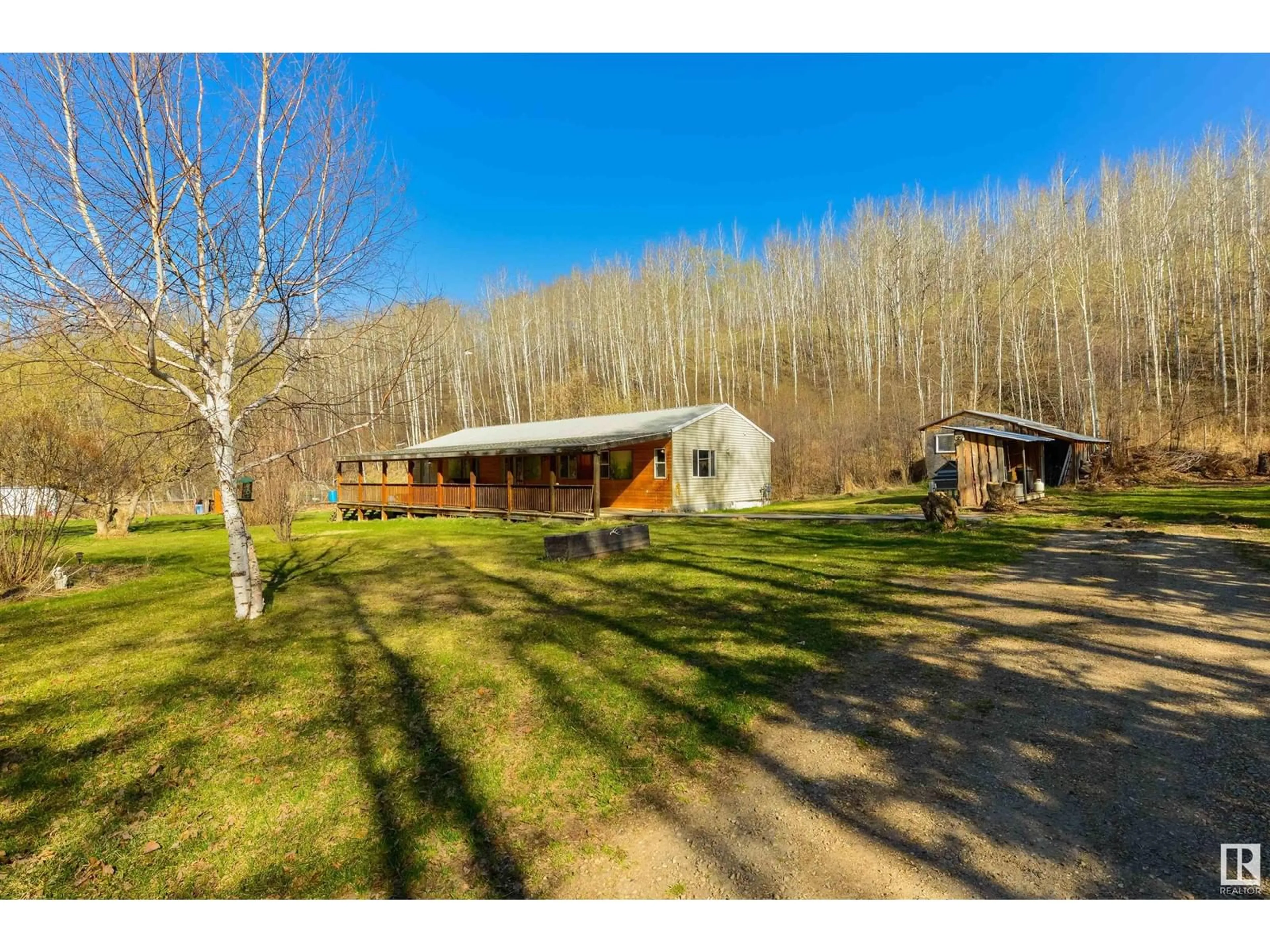 A pic from outside/outdoor area/front of a property/back of a property/a pic from drone, unknown for 4302 BURTONSVILLE RD, Rural Parkland County Alberta T0E2H0
