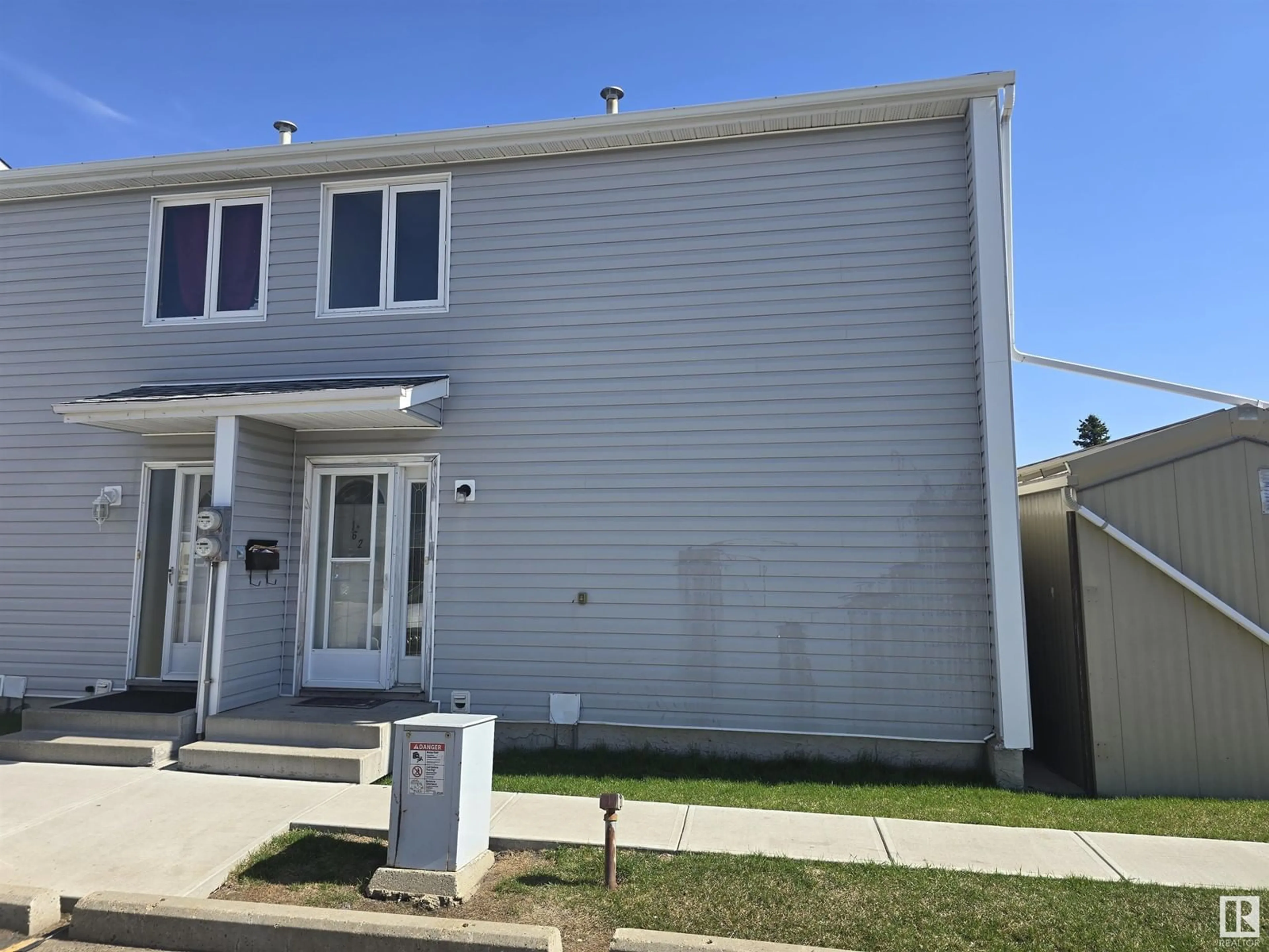 Home with vinyl exterior material, street for NW - 62 AMBERLY CO, Edmonton Alberta T5A0H9