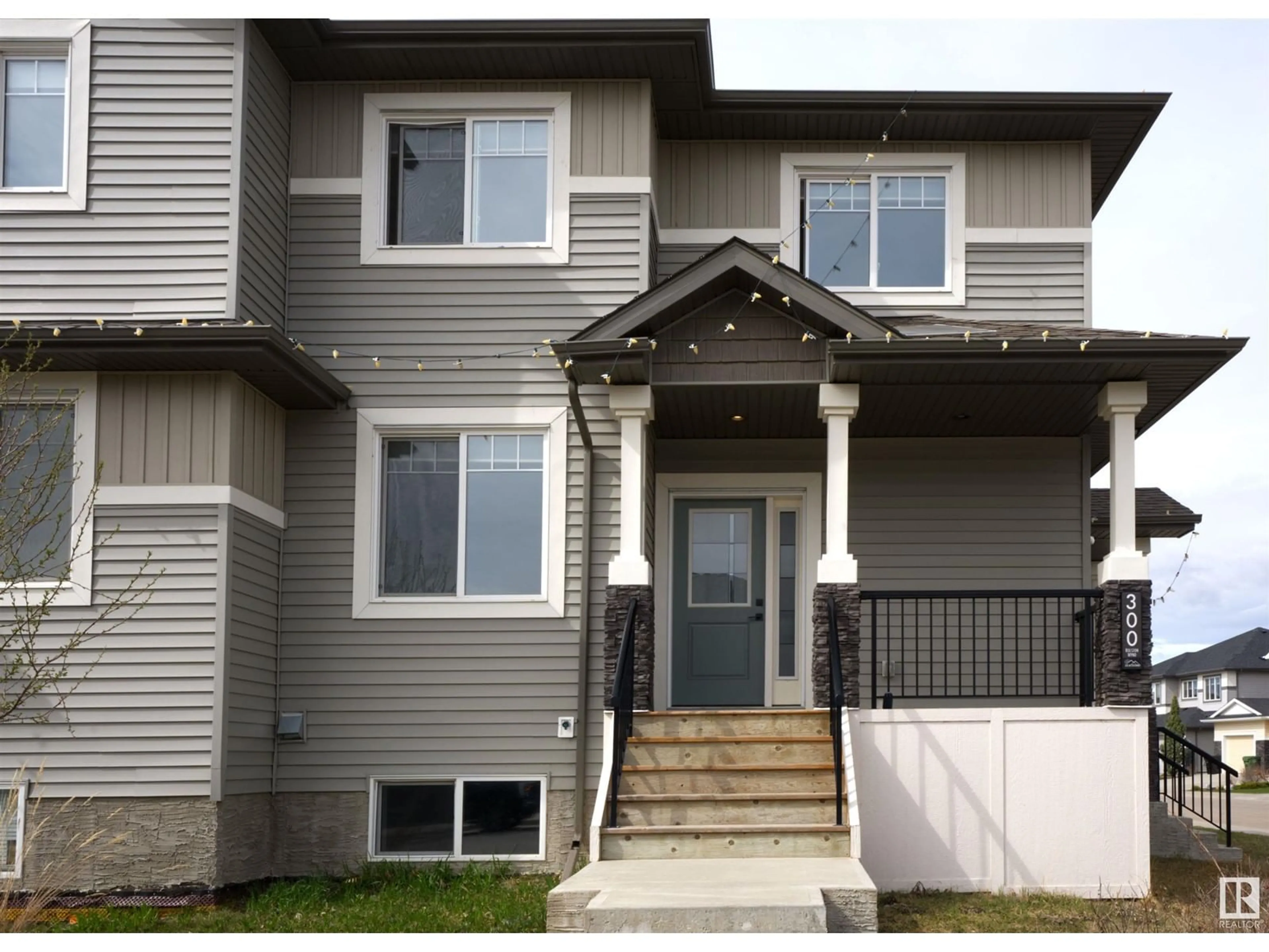 Home with vinyl exterior material, street for 300 ROLSTON WD, Leduc Alberta T9E1G5