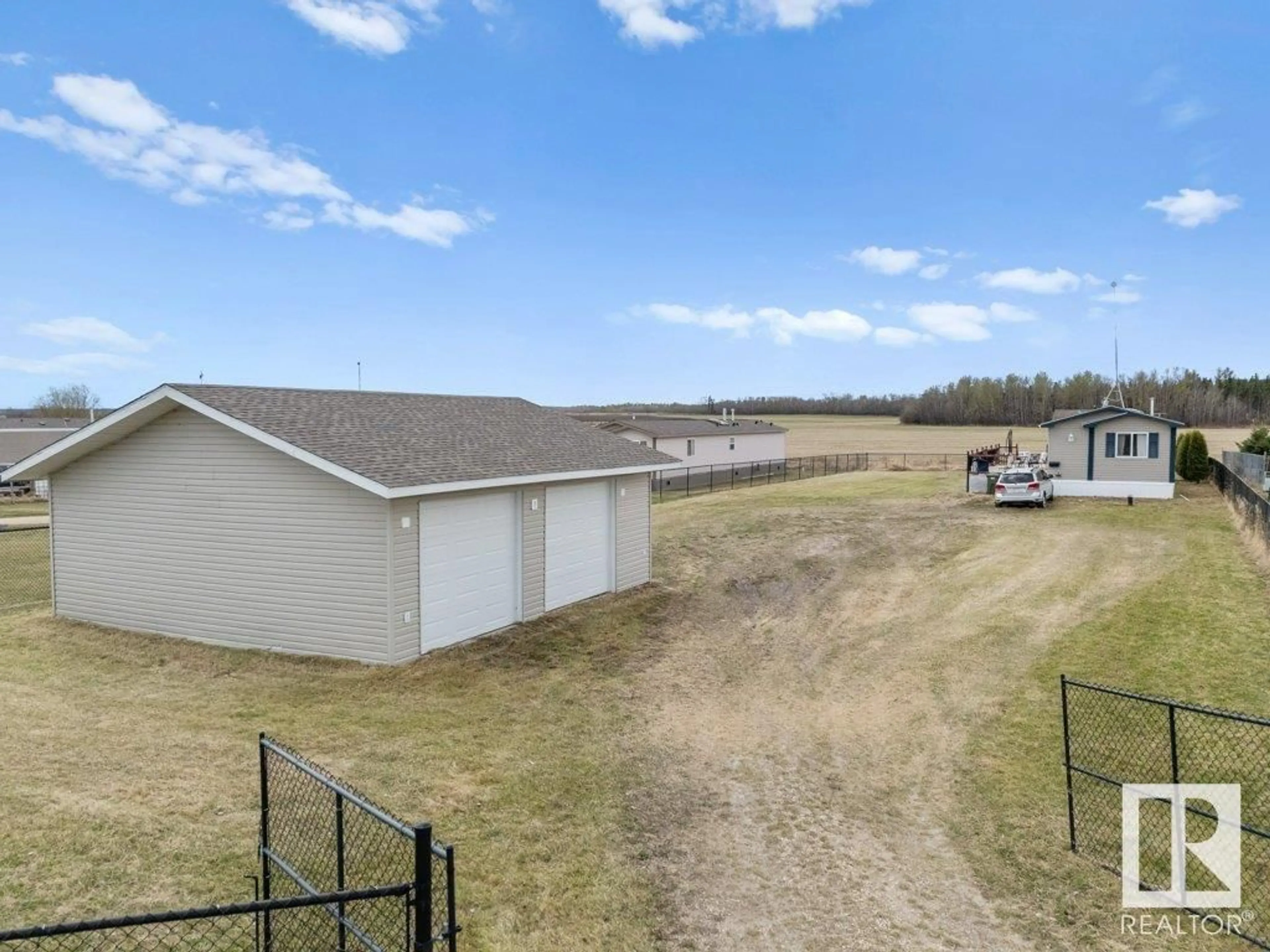 A pic from outside/outdoor area/front of a property/back of a property/a pic from drone, unknown for 3510 - 153 STE. ANNE TR, Rural Lac Ste. Anne County Alberta T0E1A0