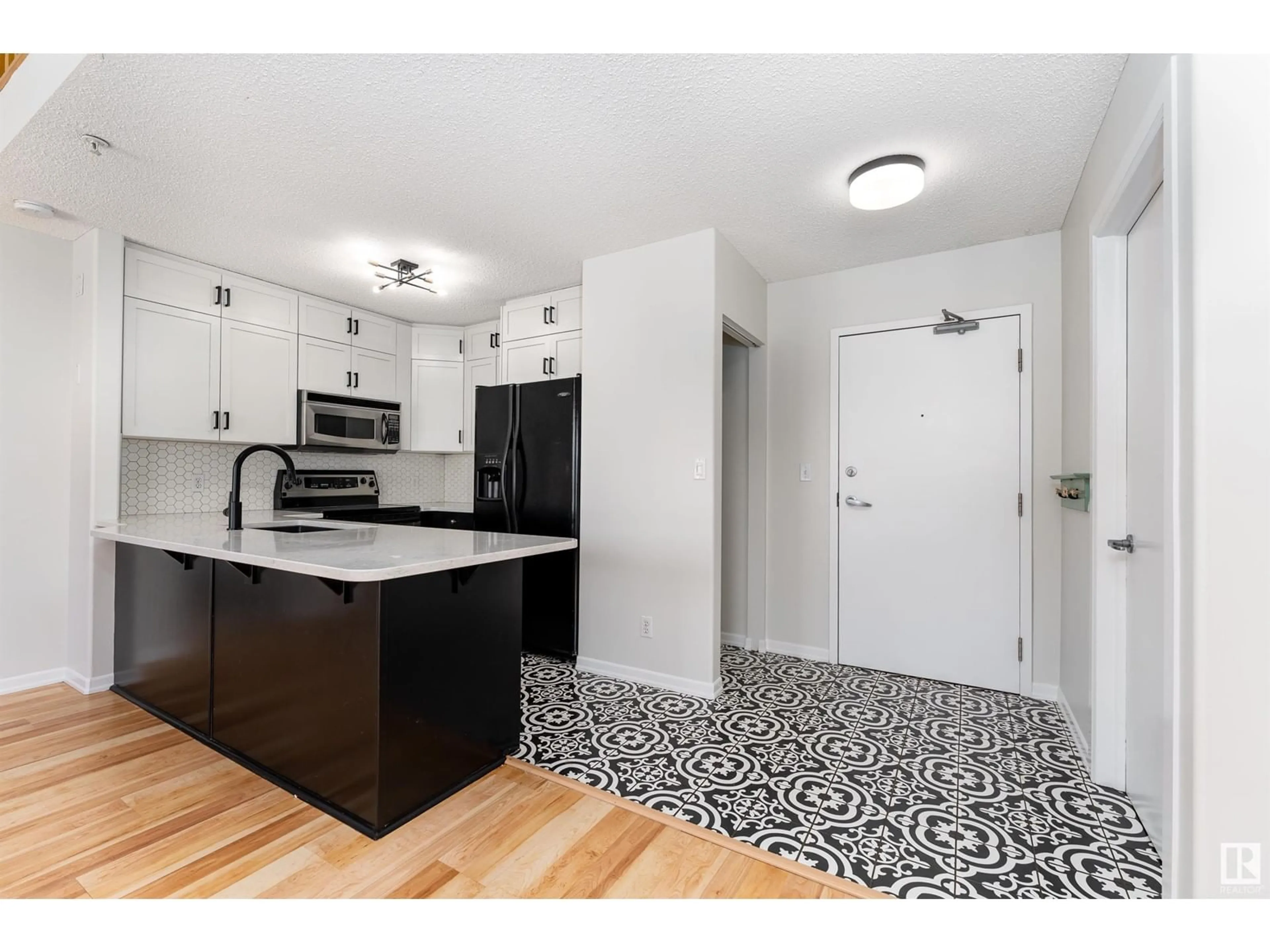 Open concept kitchen, ceramic/tile floor for 305 - 8536 106A ST NW, Edmonton Alberta T6E4J9