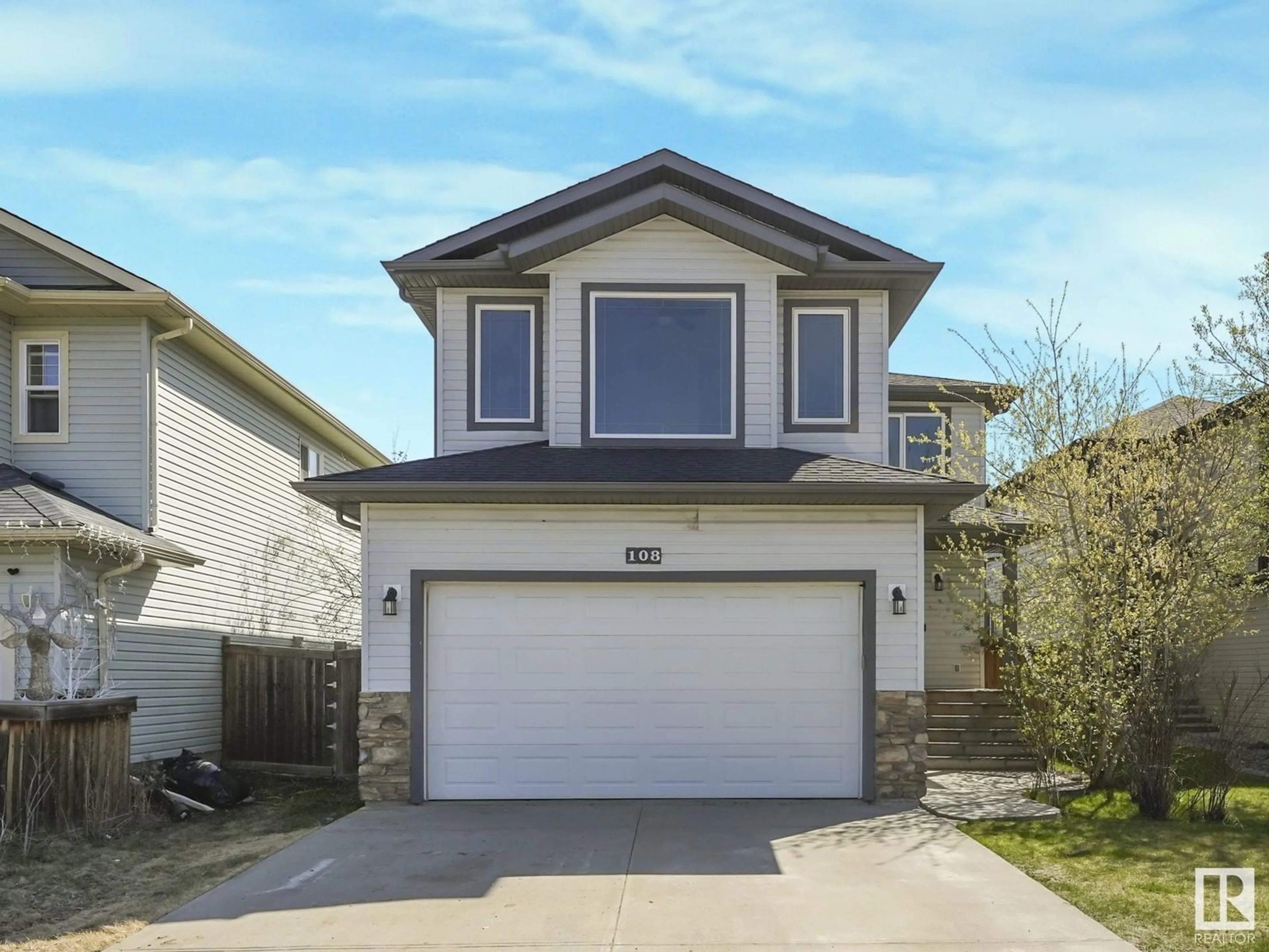 Home with vinyl exterior material, street for 108 LAMPLIGHT DR, Spruce Grove Alberta T7X0G8
