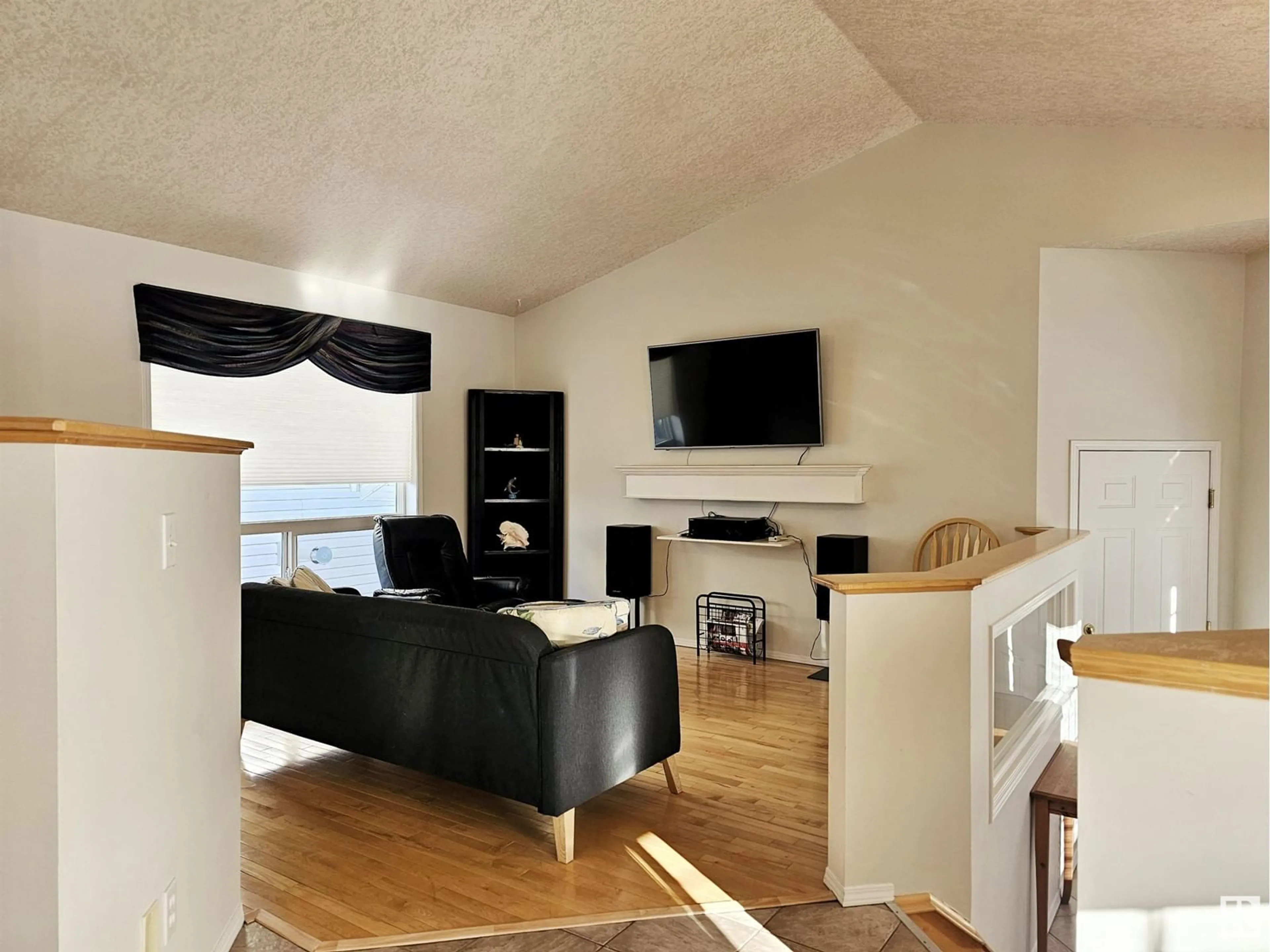 Living room with furniture, wood/laminate floor for 49 DOUCETTE PL, St. Albert Alberta T8N6S6