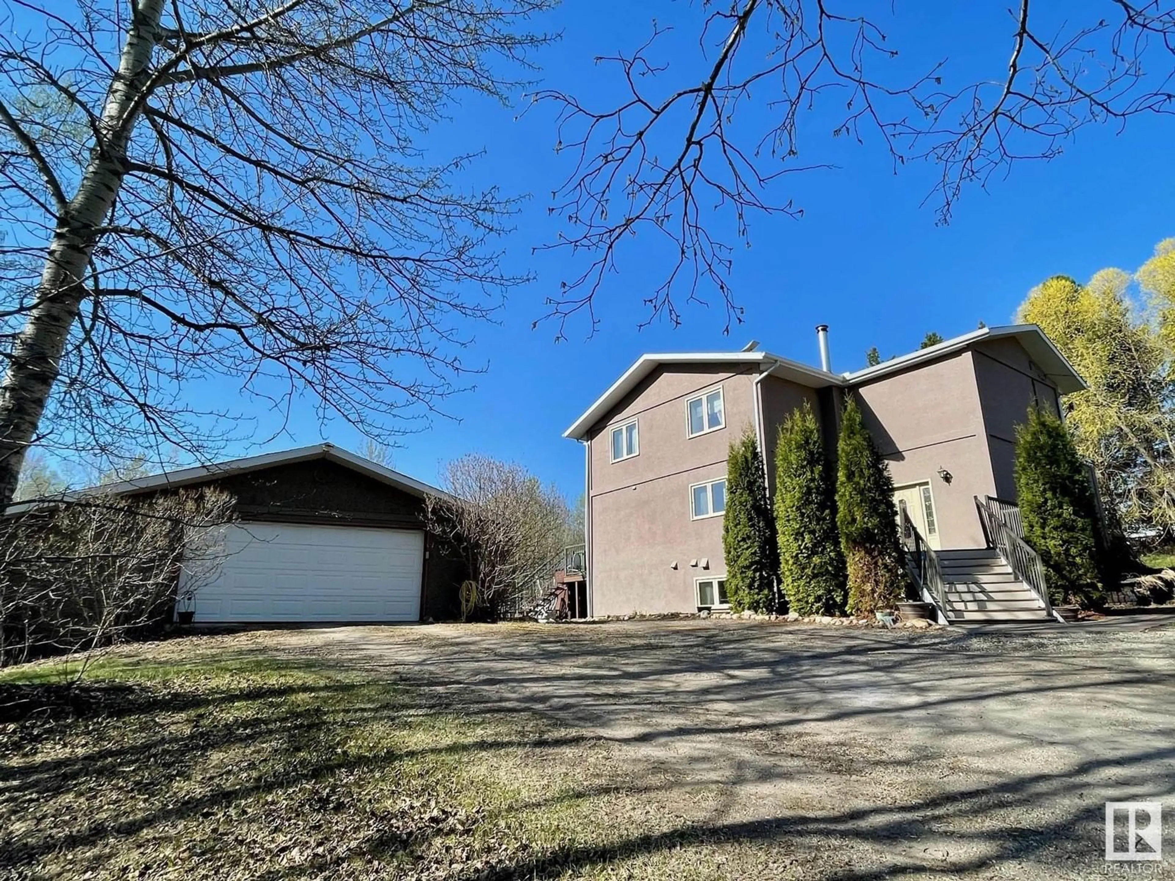 A pic from outside/outdoor area/front of a property/back of a property/a pic from drone, unknown for 1511 - 16 PARKLAND DR, Rural Parkland County Alberta T7Y2T6