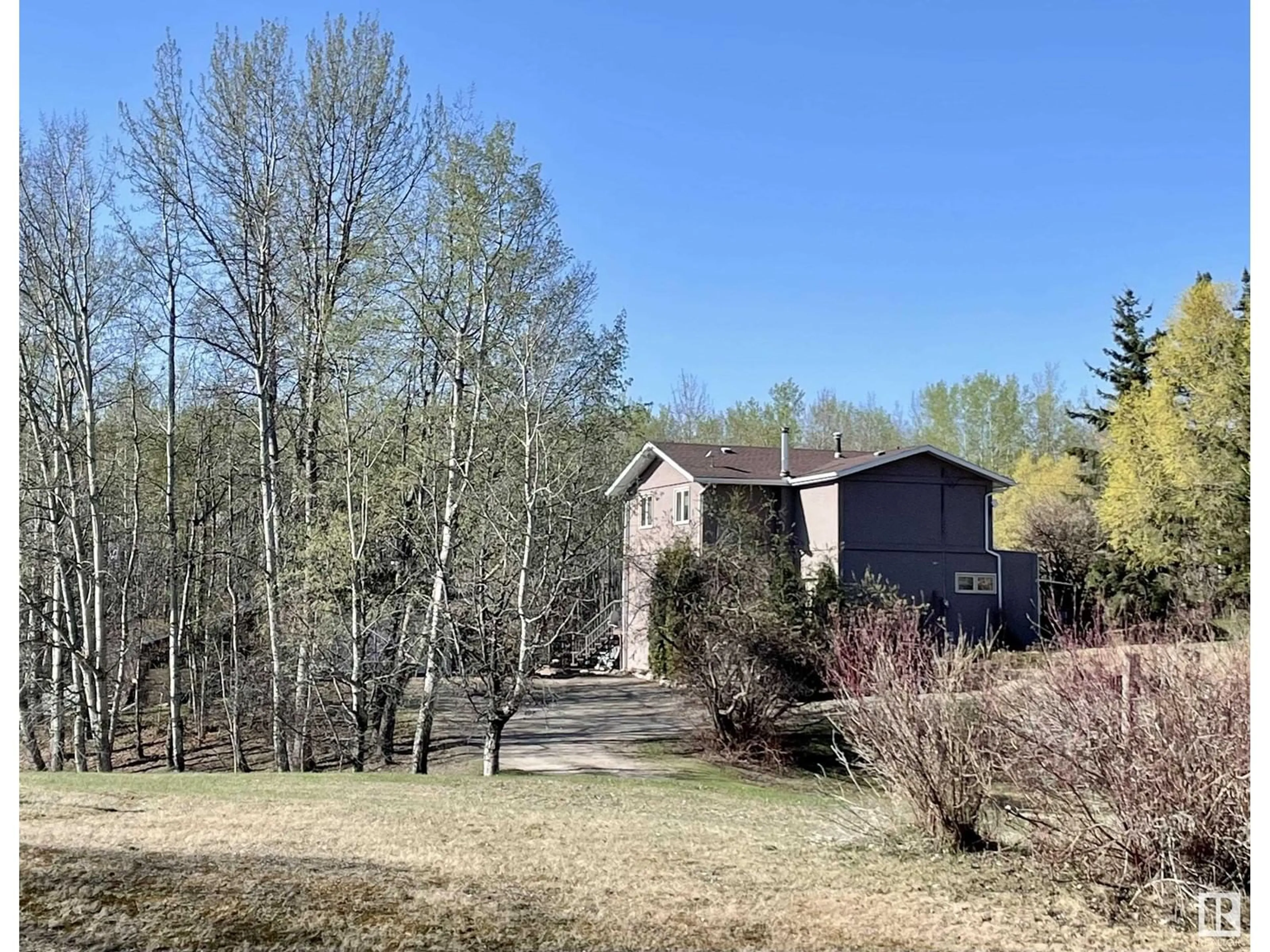 A pic from outside/outdoor area/front of a property/back of a property/a pic from drone, forest/trees view for 1511 - 16 PARKLAND DR, Rural Parkland County Alberta T7Y2T6