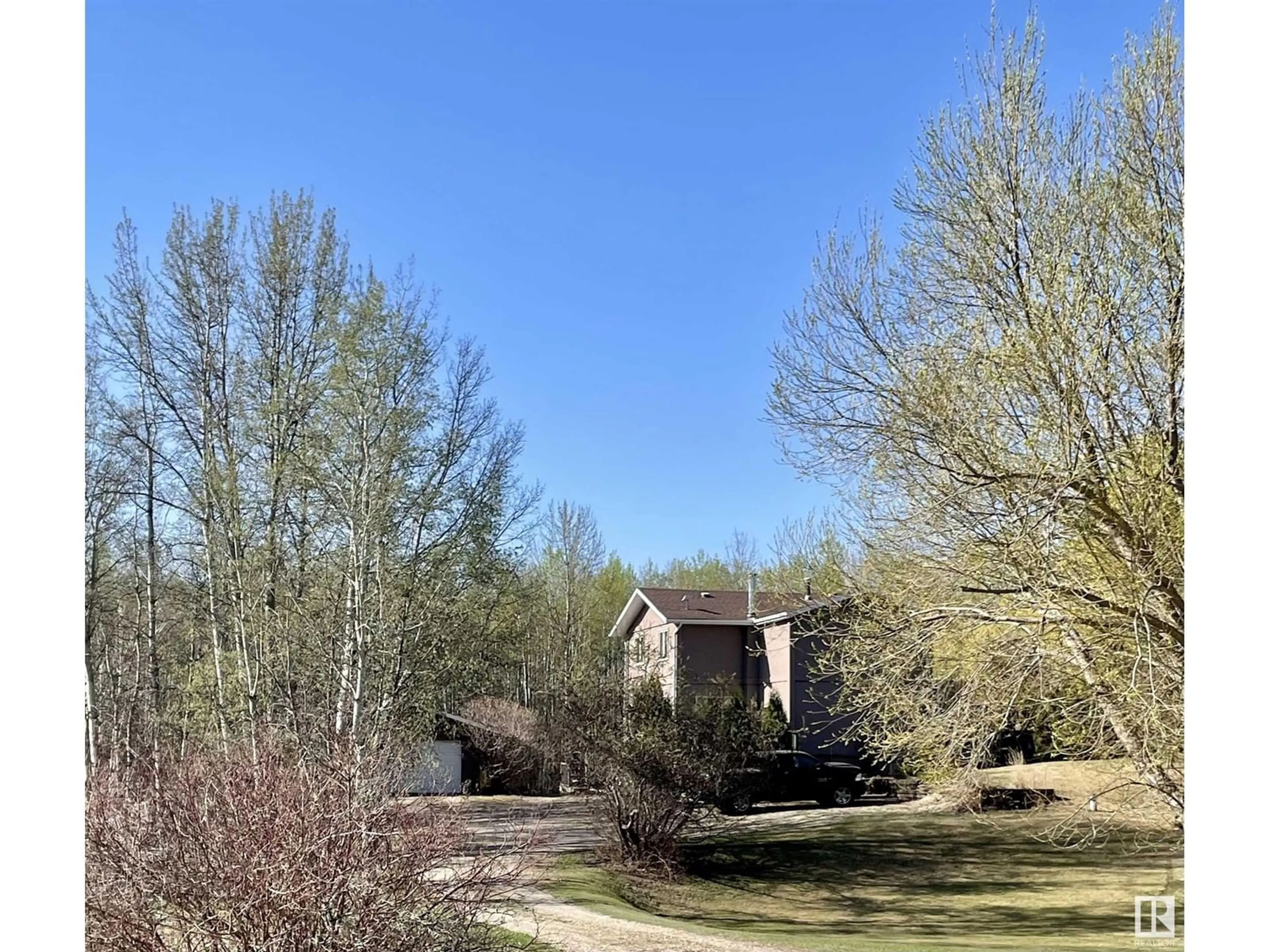 A pic from outside/outdoor area/front of a property/back of a property/a pic from drone, forest/trees view for 1511 - 16 PARKLAND DR, Rural Parkland County Alberta T7Y2T6