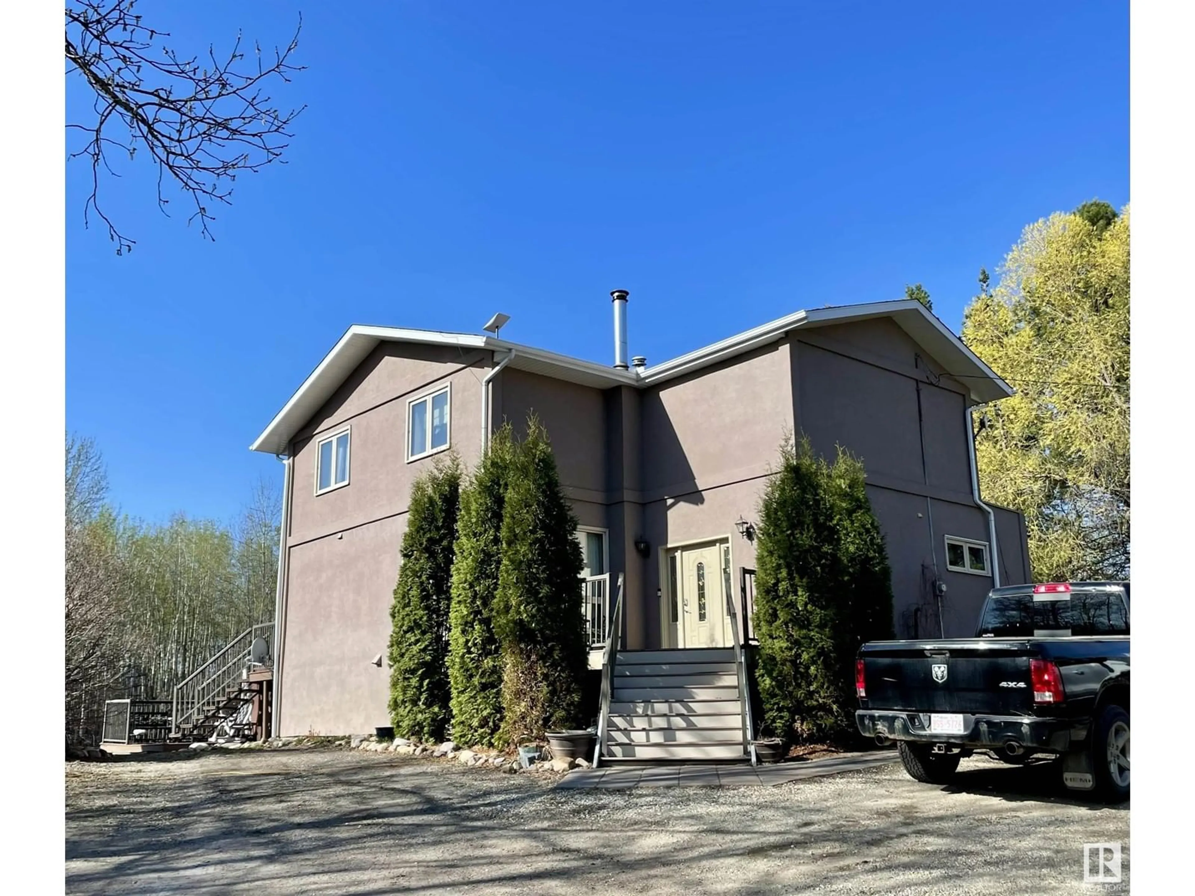 A pic from outside/outdoor area/front of a property/back of a property/a pic from drone, building for 1511 - 16 PARKLAND DR, Rural Parkland County Alberta T7Y2T6