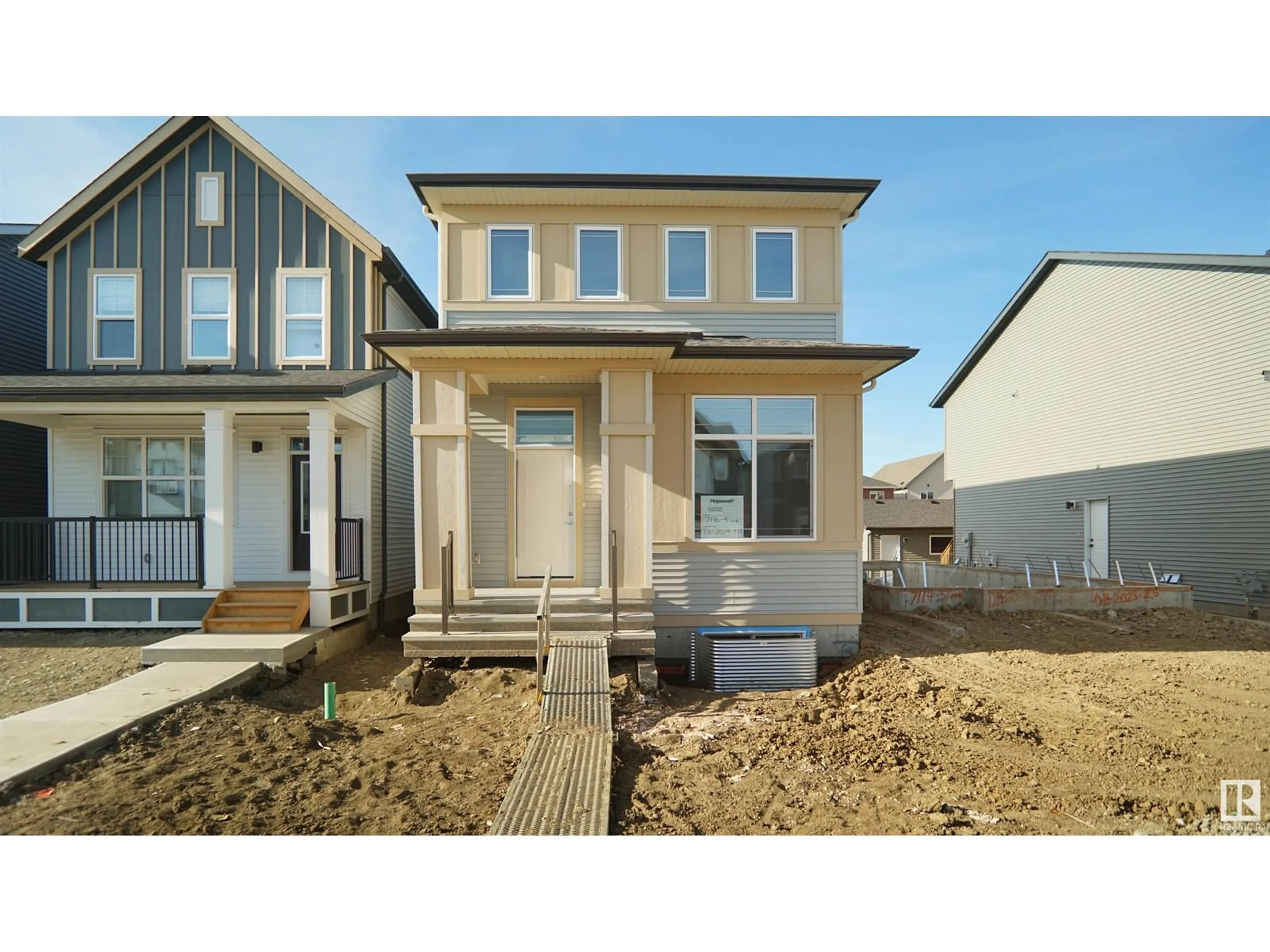 Home with vinyl exterior material, street for 7116 51 AV, Beaumont Alberta T4X3E6