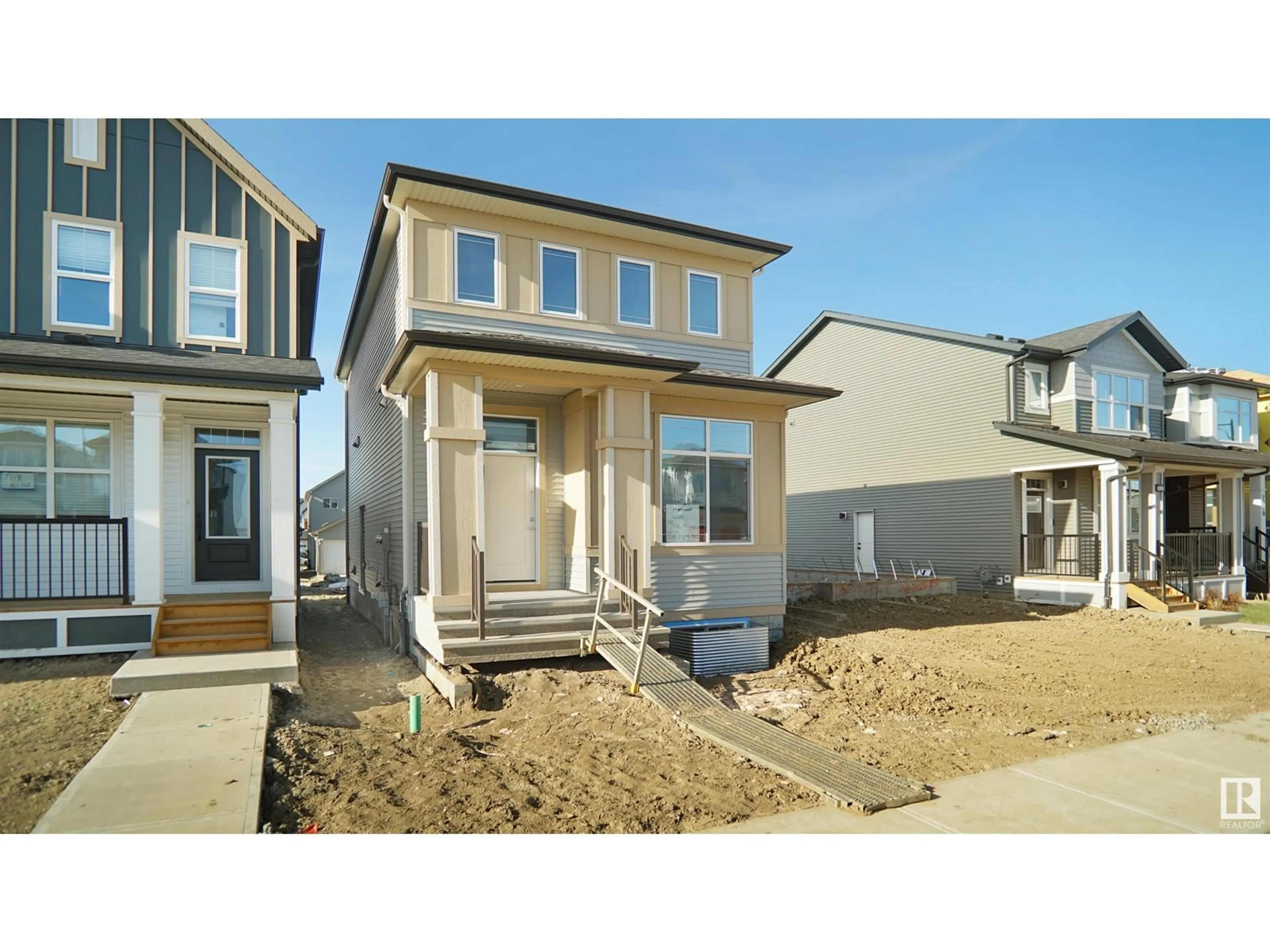 Home with vinyl exterior material, street for 7116 51 AV, Beaumont Alberta T4X3E6