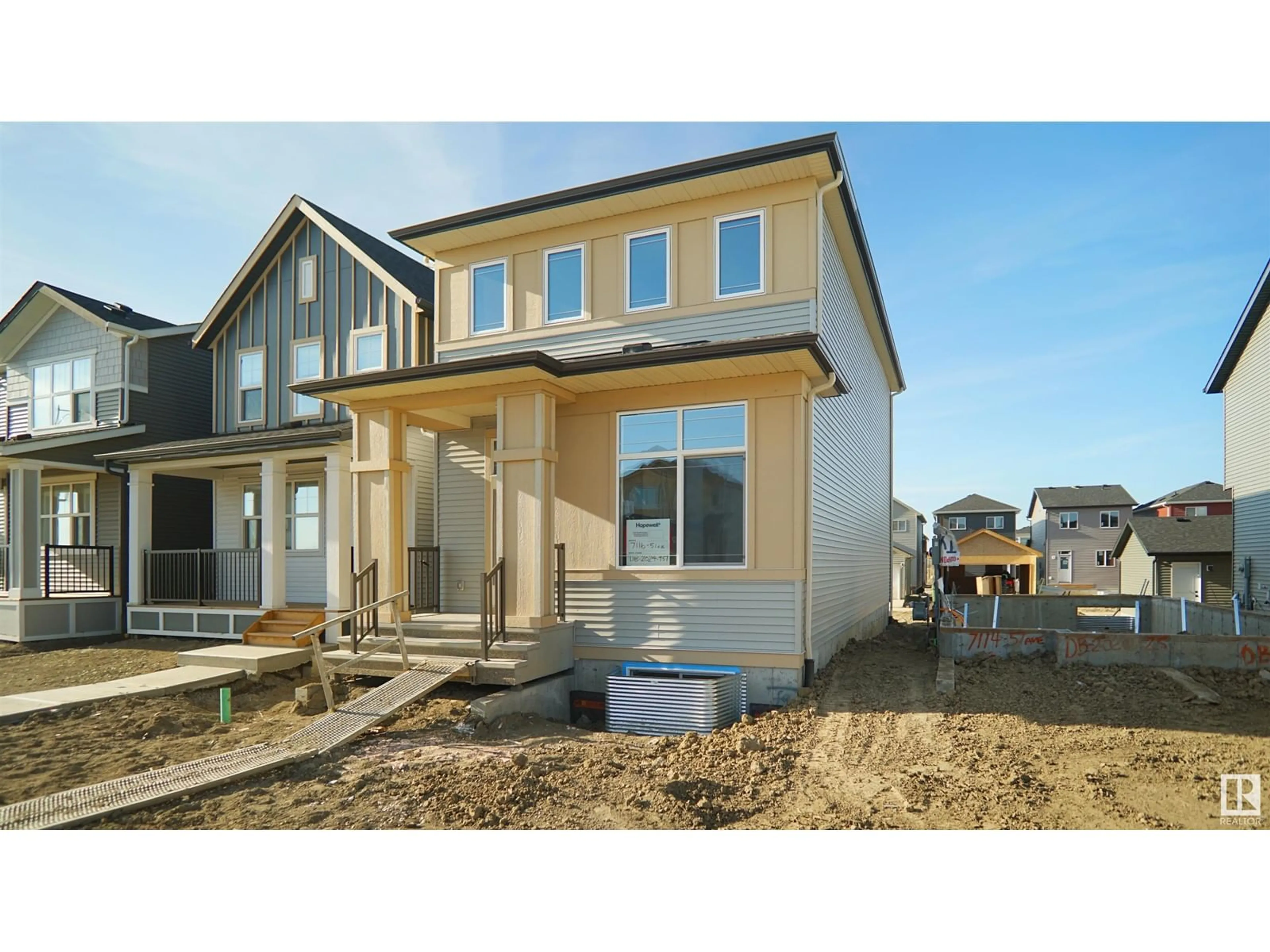 Home with vinyl exterior material, street for 7116 51 AV, Beaumont Alberta T4X3E6
