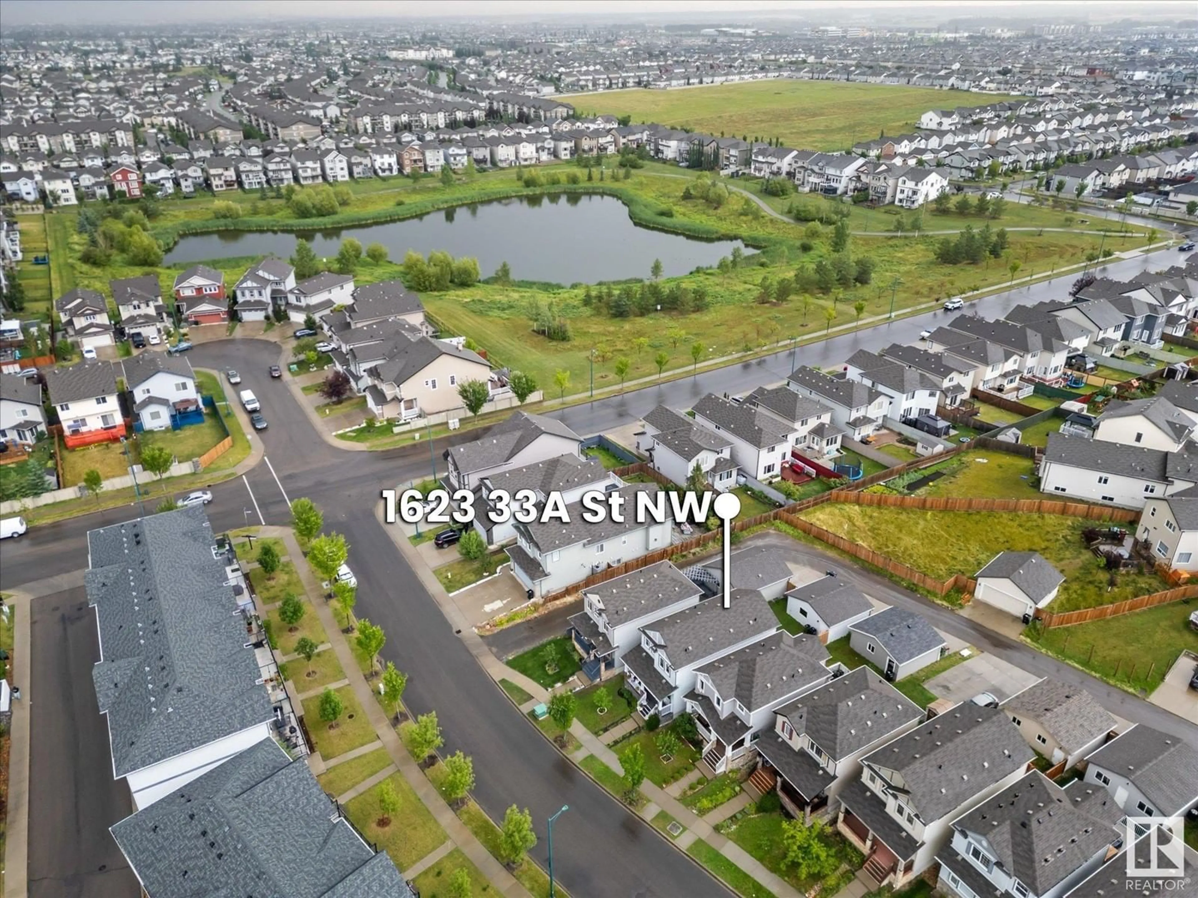 A pic from outside/outdoor area/front of a property/back of a property/a pic from drone, street for NW - 1623 33A ST, Edmonton Alberta T6T0X5