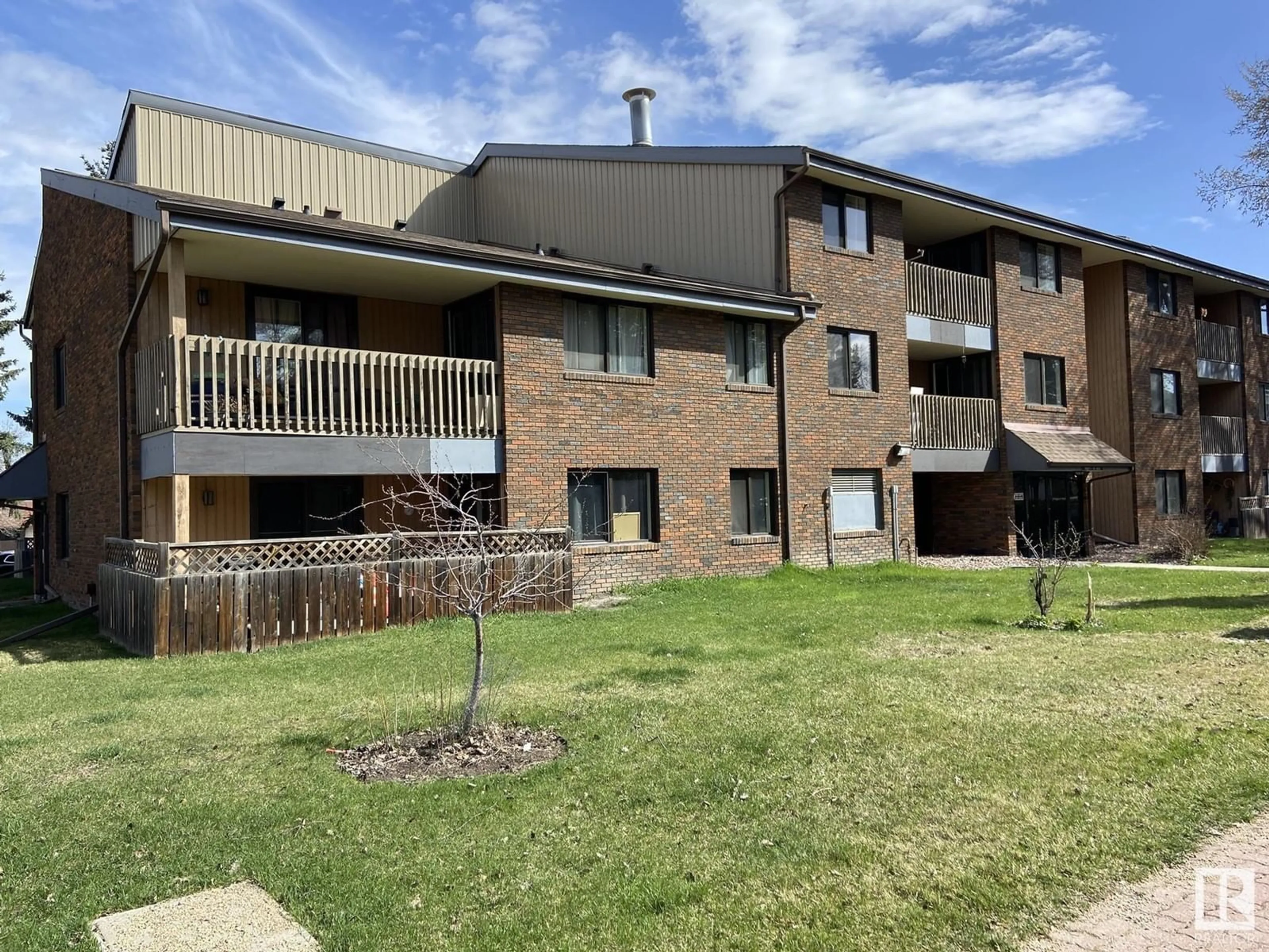 A pic from outside/outdoor area/front of a property/back of a property/a pic from drone, building for #312 - 14811 51 AV, Edmonton Alberta T6H5G4