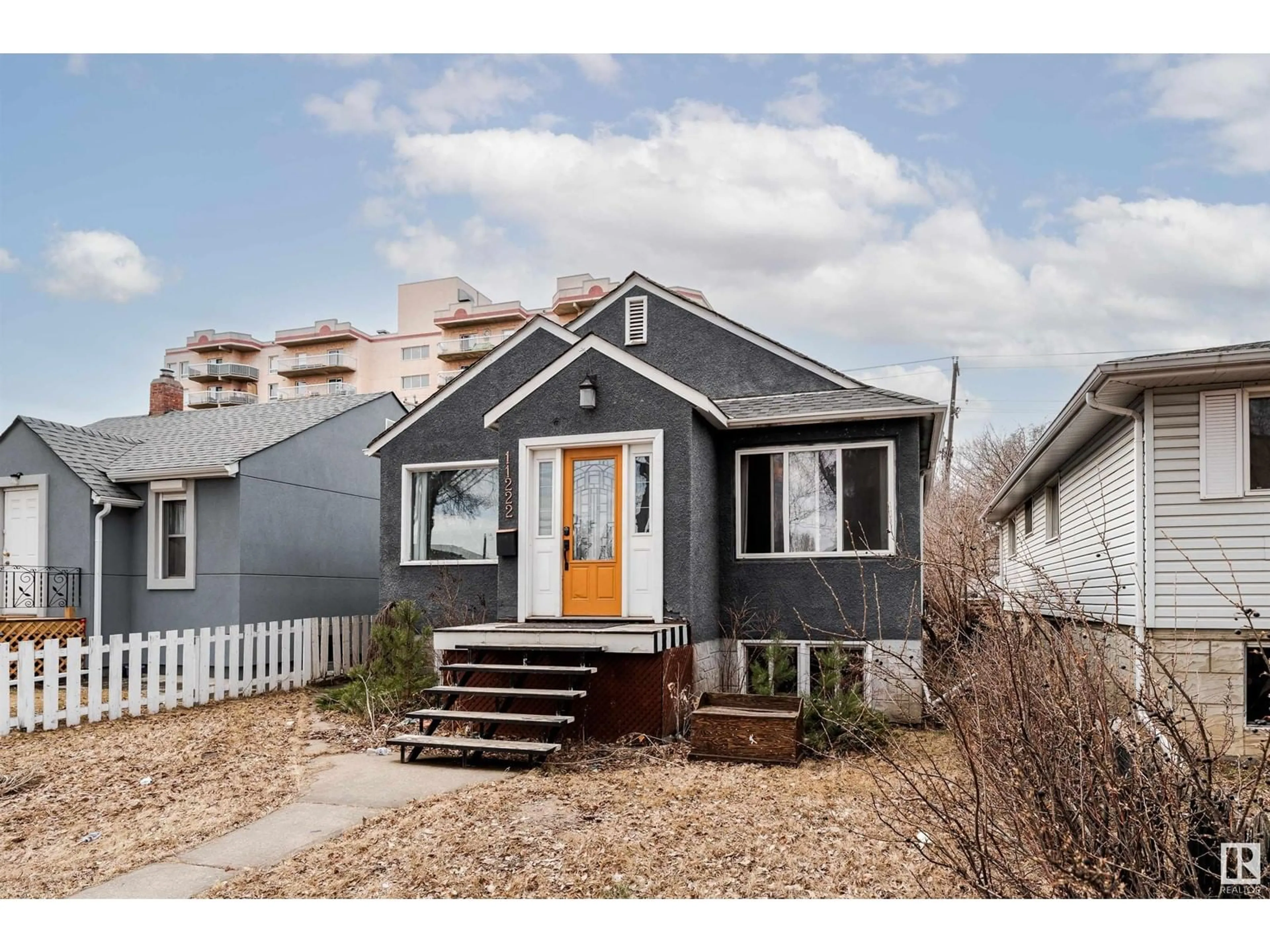 Home with vinyl exterior material, street for NW - 11222 84 ST, Edmonton Alberta T5B3A9