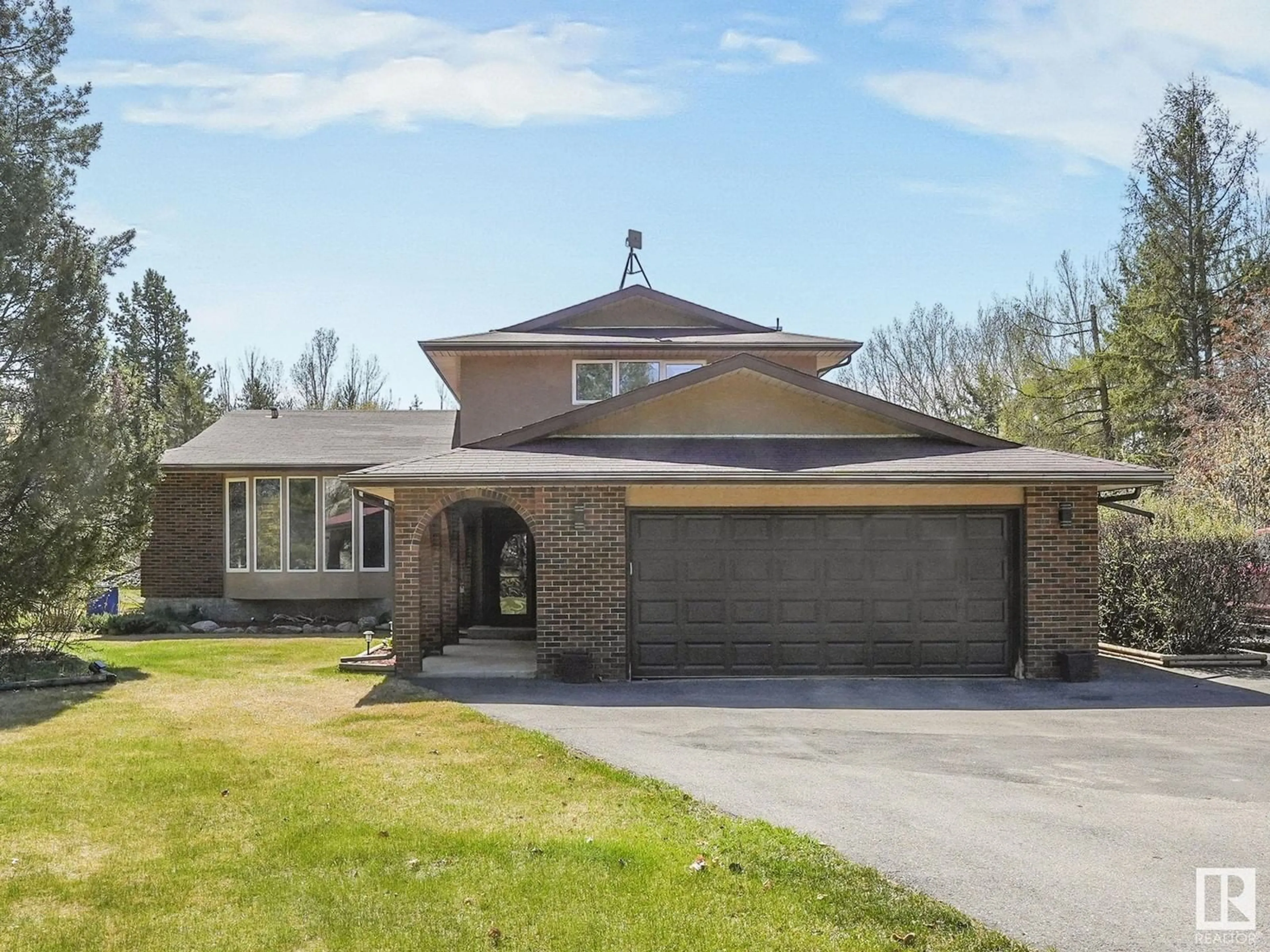 Home with brick exterior material, street for 49 24119 TWP ROAD 554, Rural Sturgeon County Alberta T5E5S7
