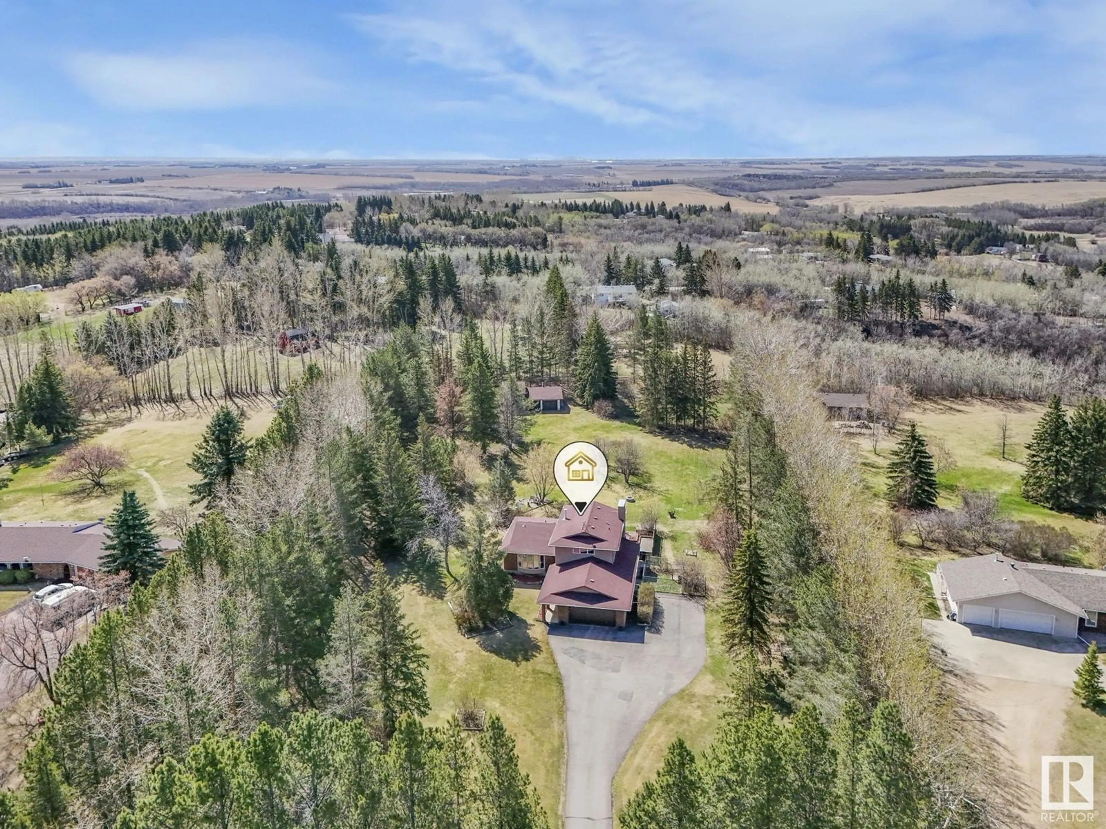 A pic from outside/outdoor area/front of a property/back of a property/a pic from drone, mountain view for 49 24119 TWP ROAD 554, Rural Sturgeon County Alberta T5E5S7