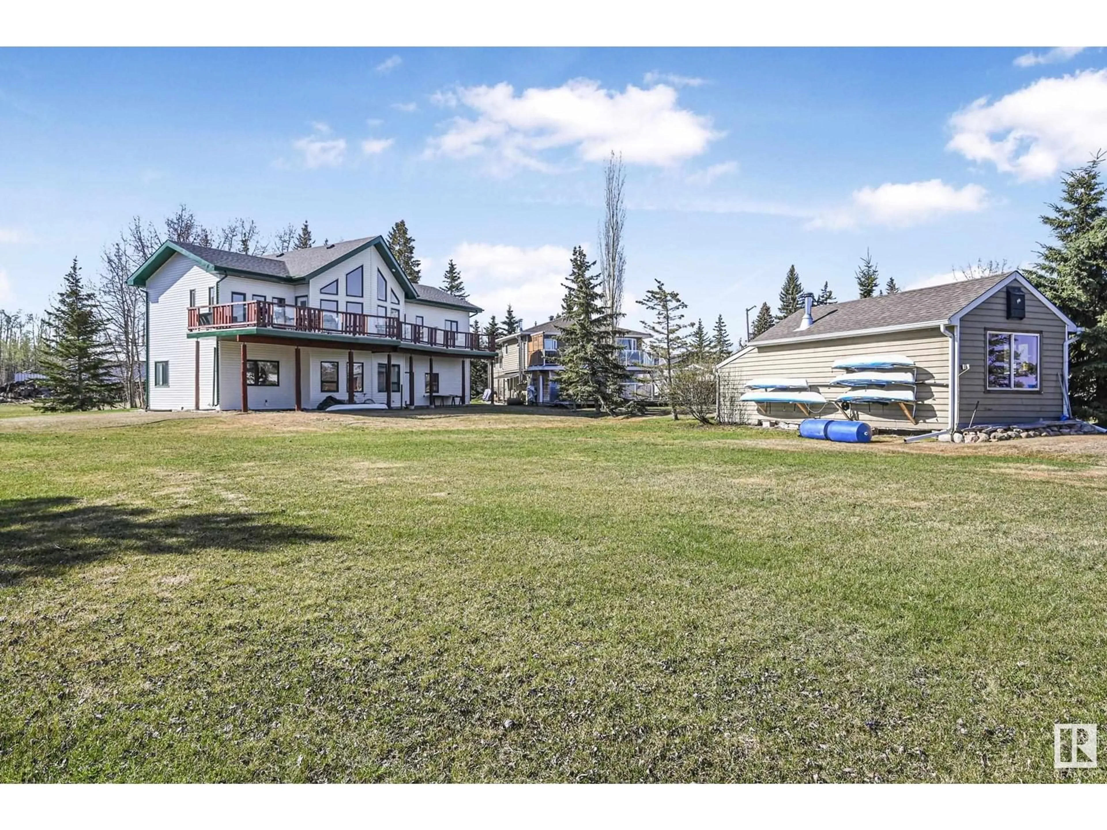 A pic from outside/outdoor area/front of a property/back of a property/a pic from drone, mountain view for 48003 - 120 RGE ROAD 271, Rural Leduc County Alberta T0C2P0