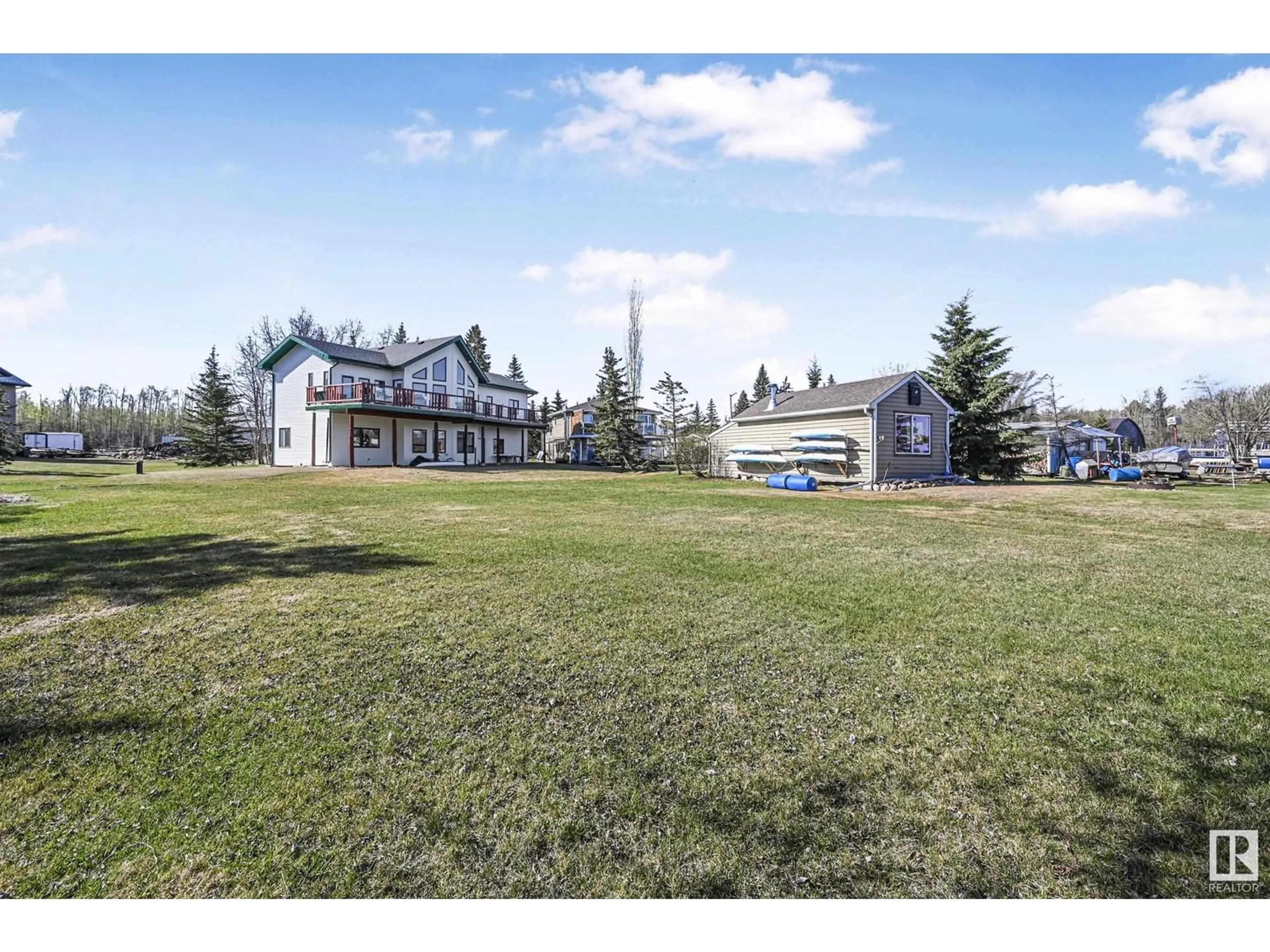 A pic from outside/outdoor area/front of a property/back of a property/a pic from drone, mountain view for 48003 - 120 RGE ROAD 271, Rural Leduc County Alberta T0C2P0