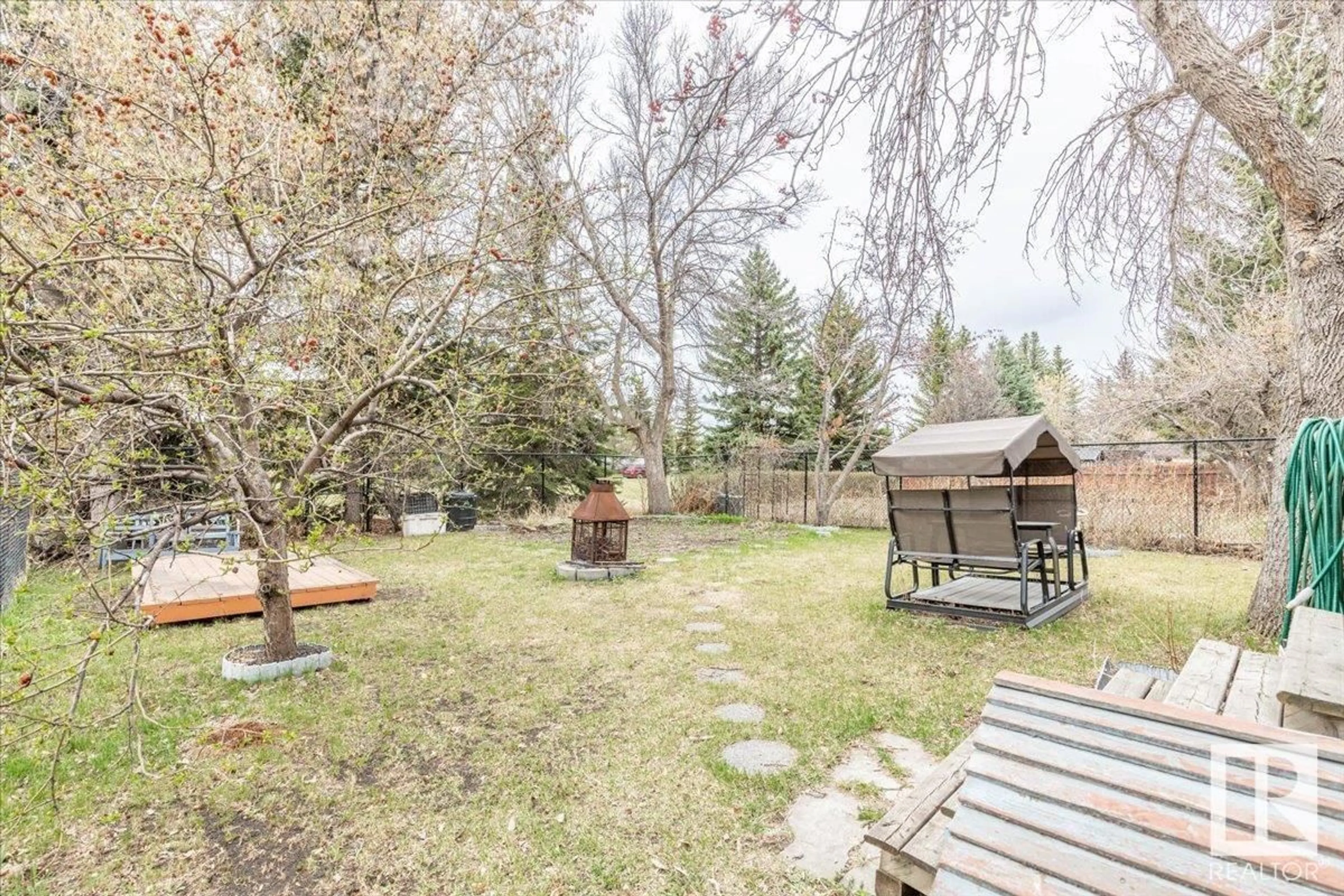 Patio, forest/trees view for 1420 65 ST, Edmonton Alberta T6L2J1