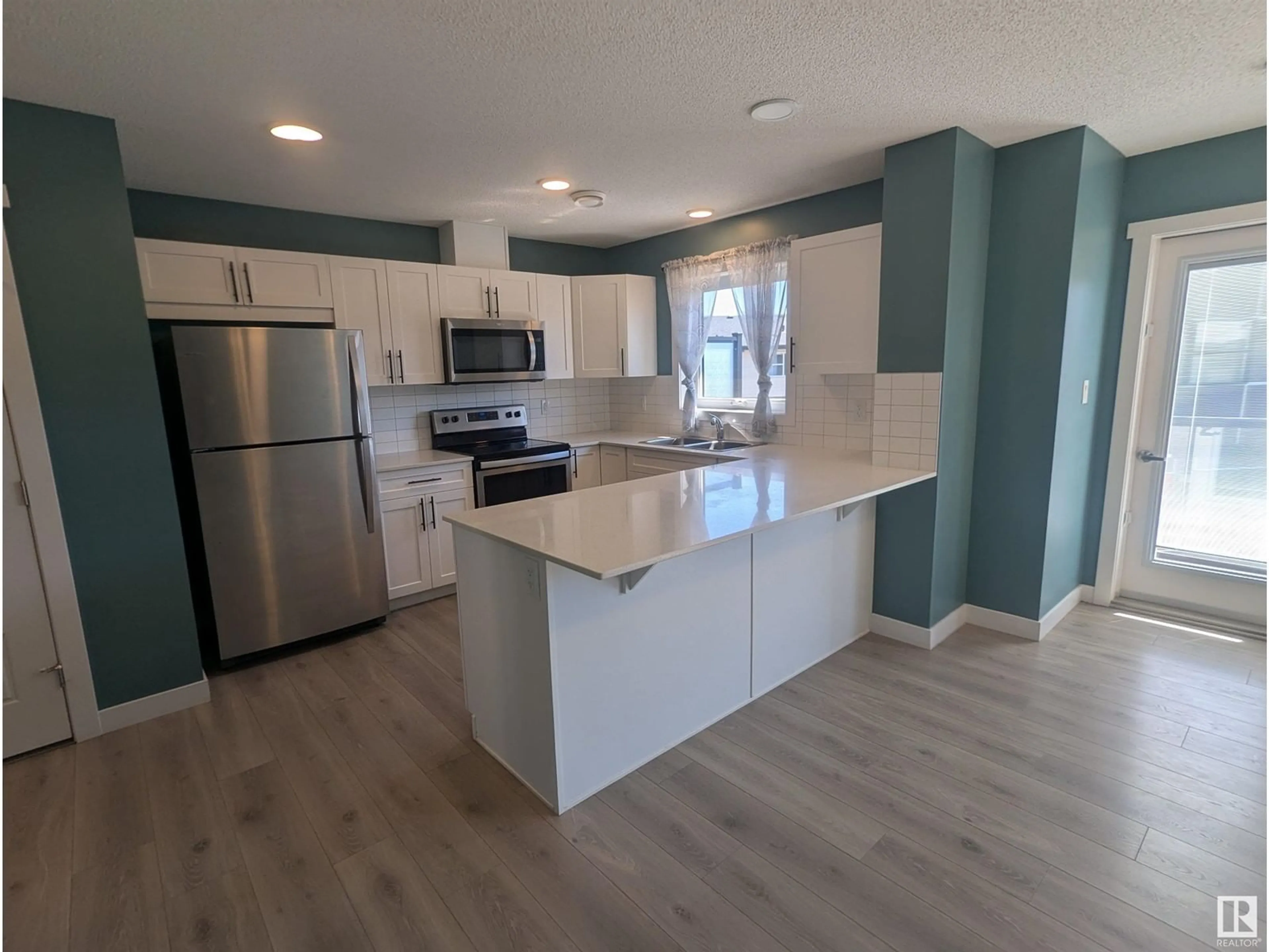 Open concept kitchen, unknown for 98 - 1203 163 ST, Edmonton Alberta T6W3X1
