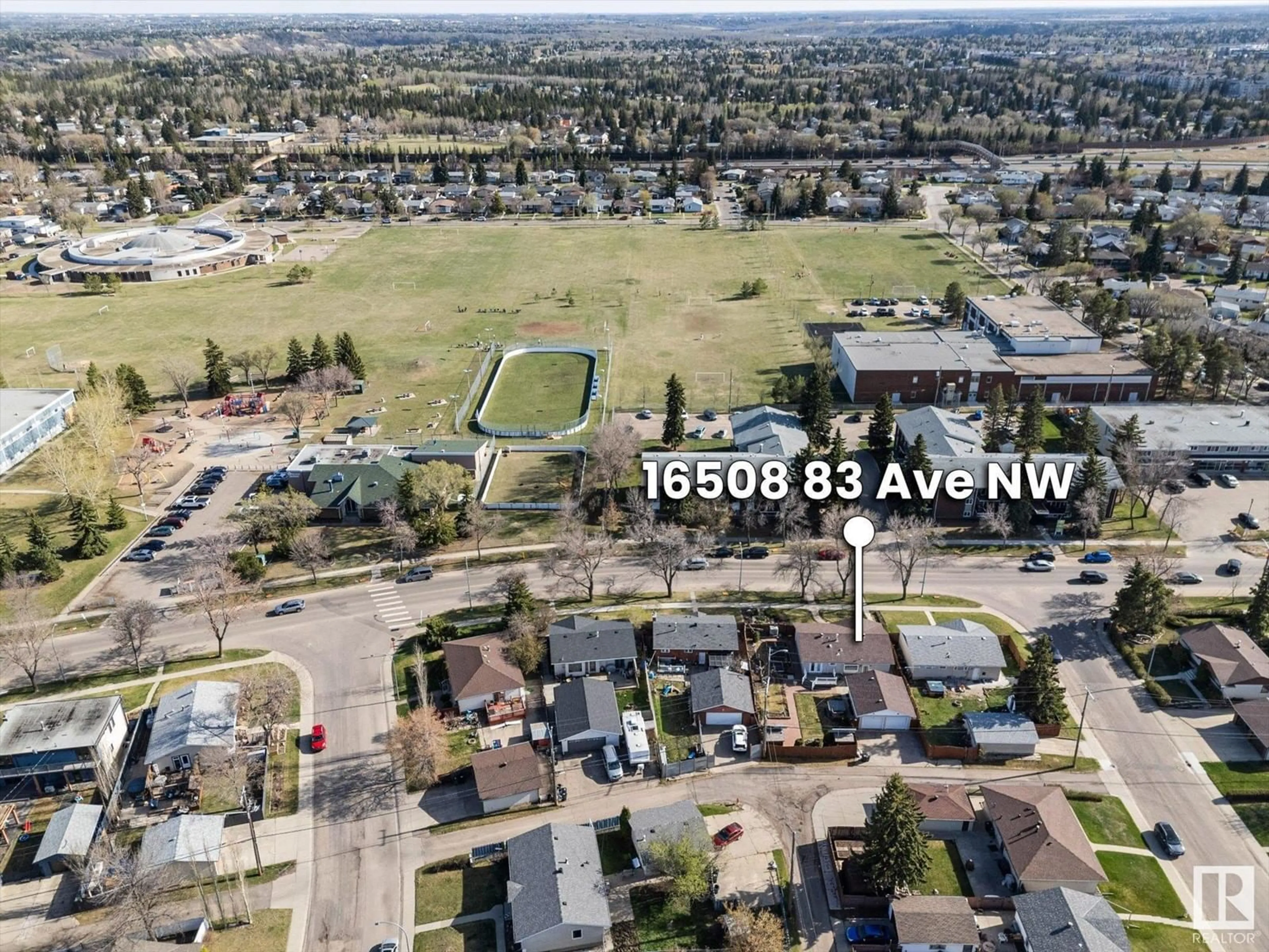 A pic from outside/outdoor area/front of a property/back of a property/a pic from drone, street for 16508 83 AV, Edmonton Alberta T5R3W1
