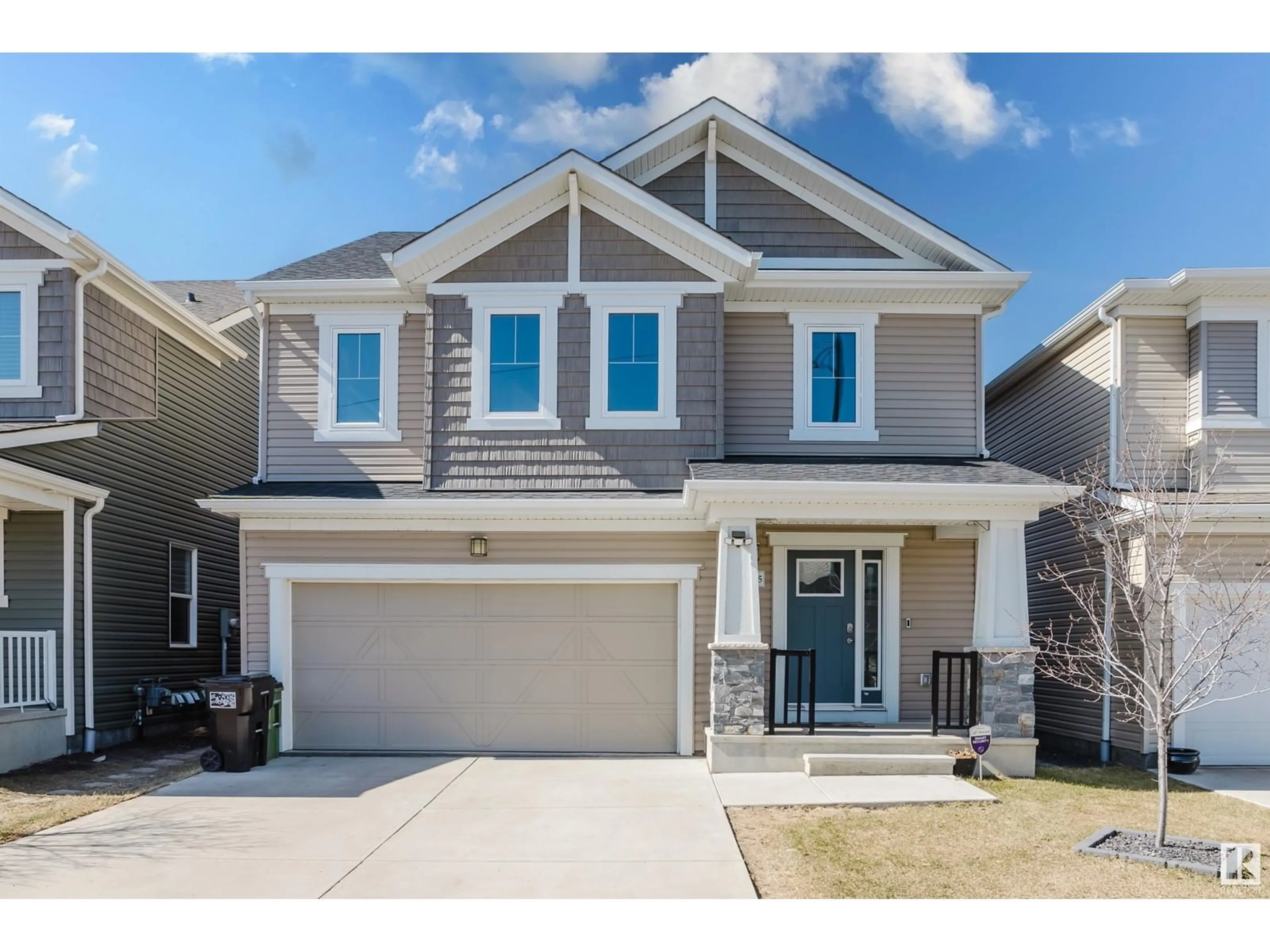 Home with vinyl exterior material, street for NW - 20015 18 AV, Edmonton Alberta T6M0Y1