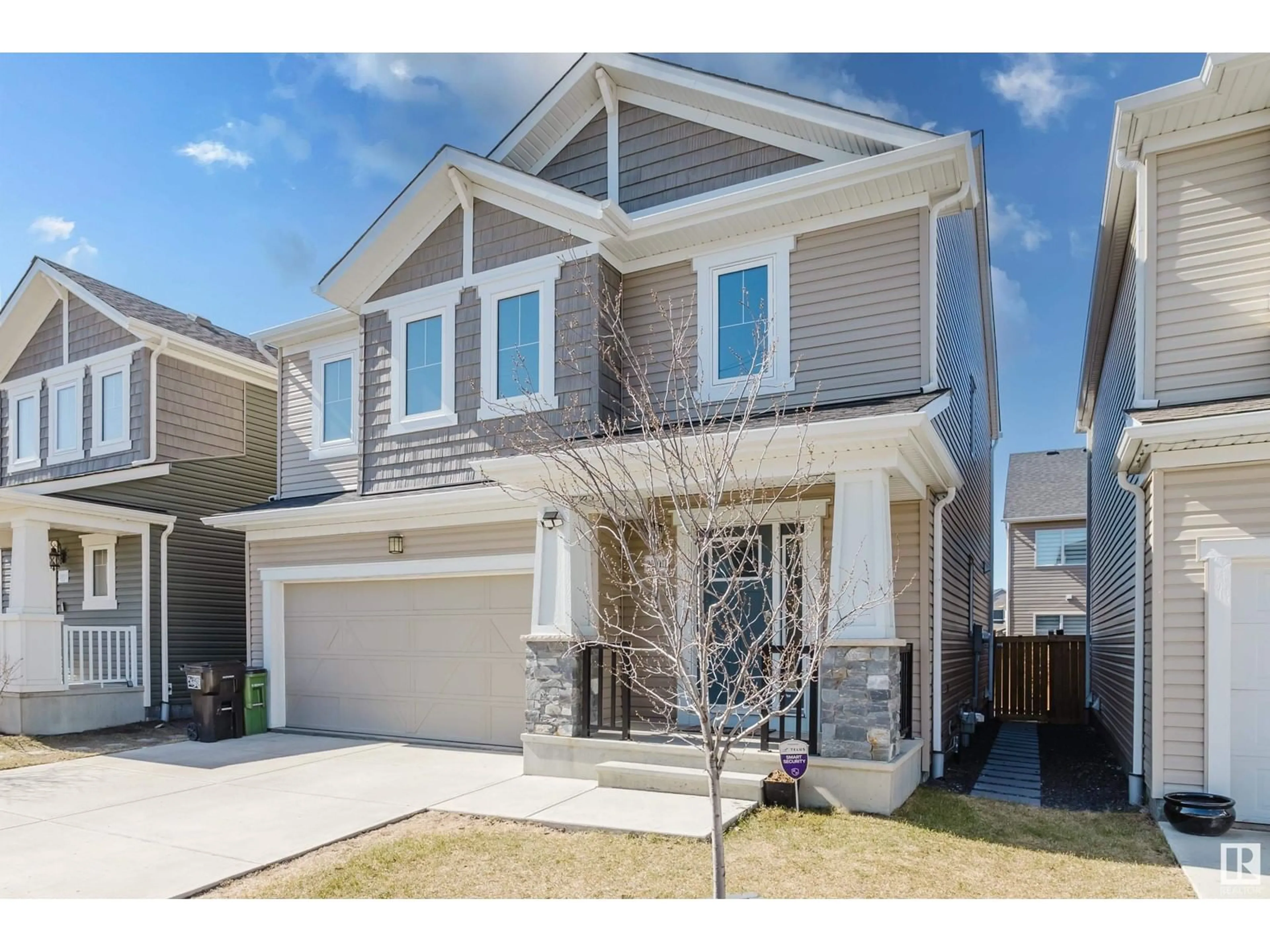 Home with vinyl exterior material, street for NW - 20015 18 AV, Edmonton Alberta T6M0Y1