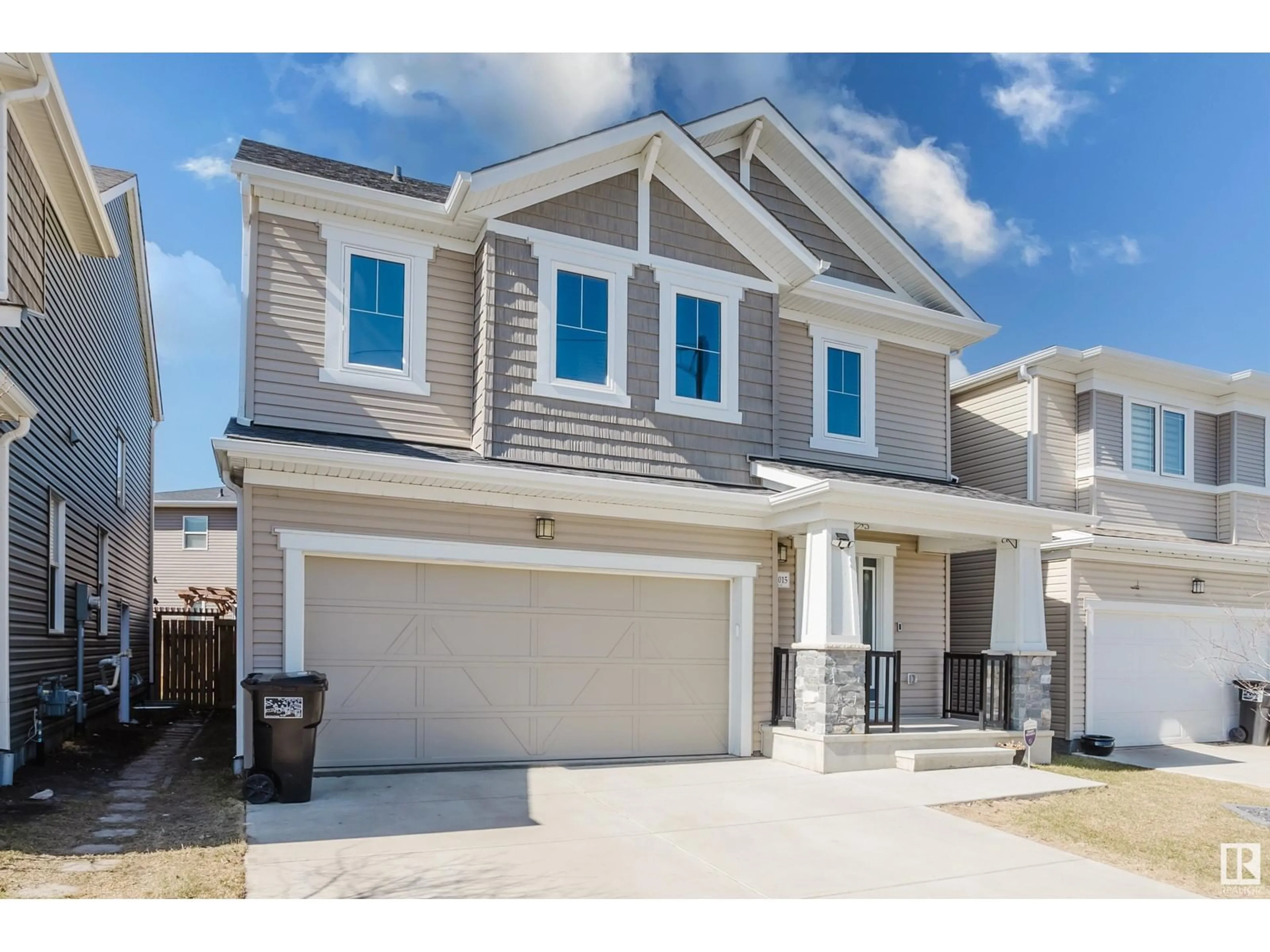 Home with vinyl exterior material, street for NW - 20015 18 AV, Edmonton Alberta T6M0Y1