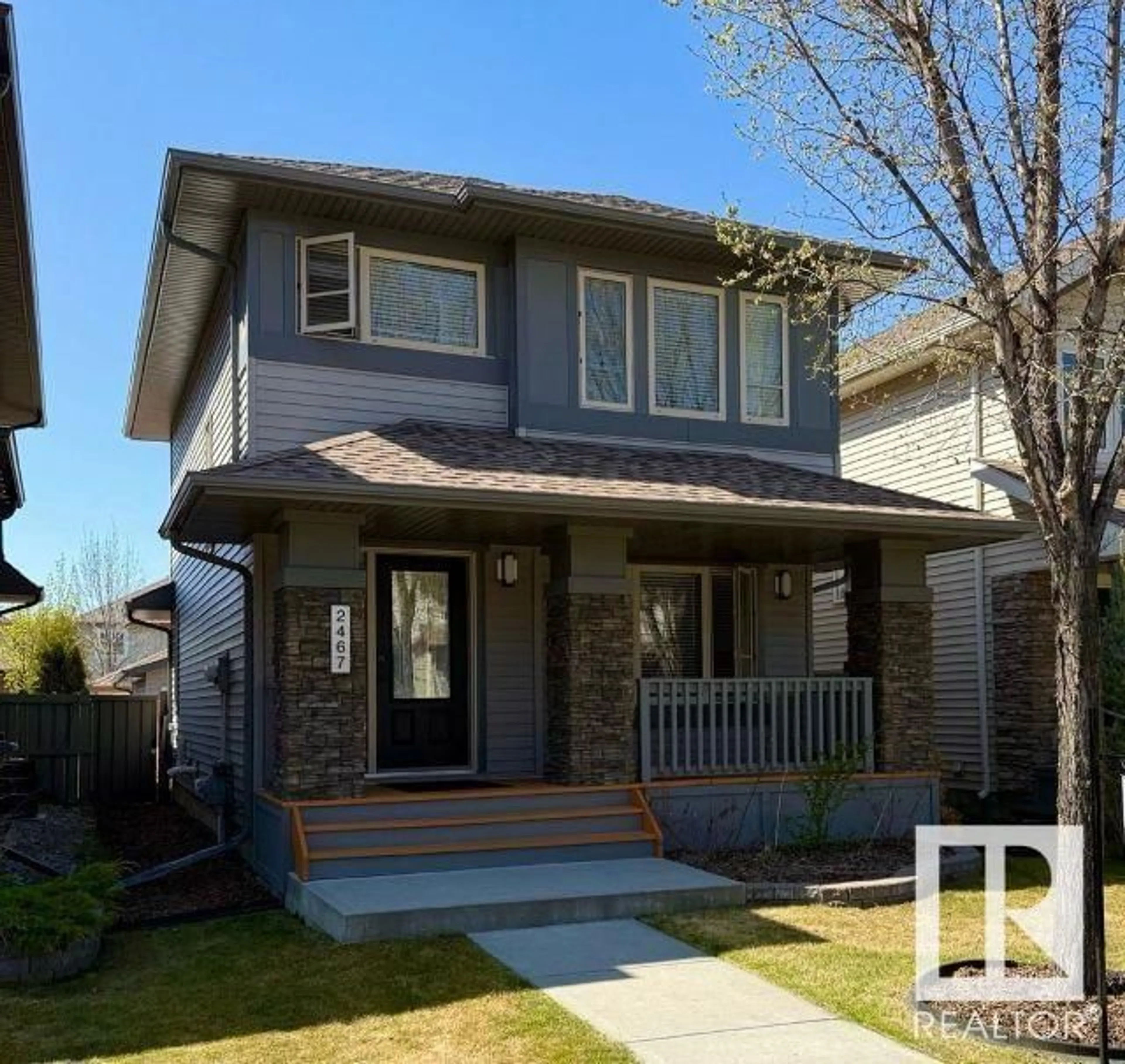 Home with vinyl exterior material, street for SW - 2467 AUSTIN CR, Edmonton Alberta T6W0L4