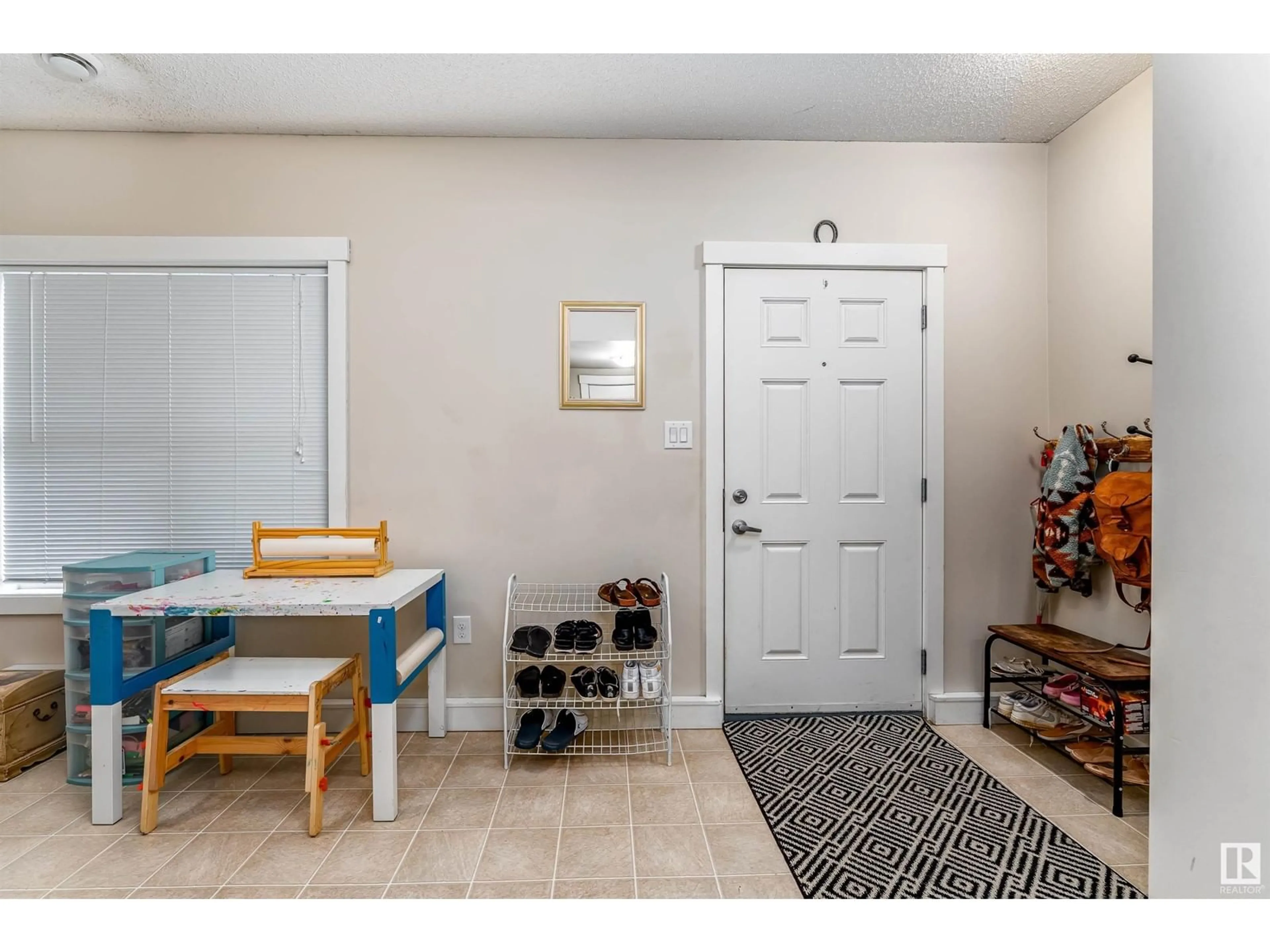 Indoor entryway for 19 8315 180 AV NW, Edmonton Alberta T5Z0J2