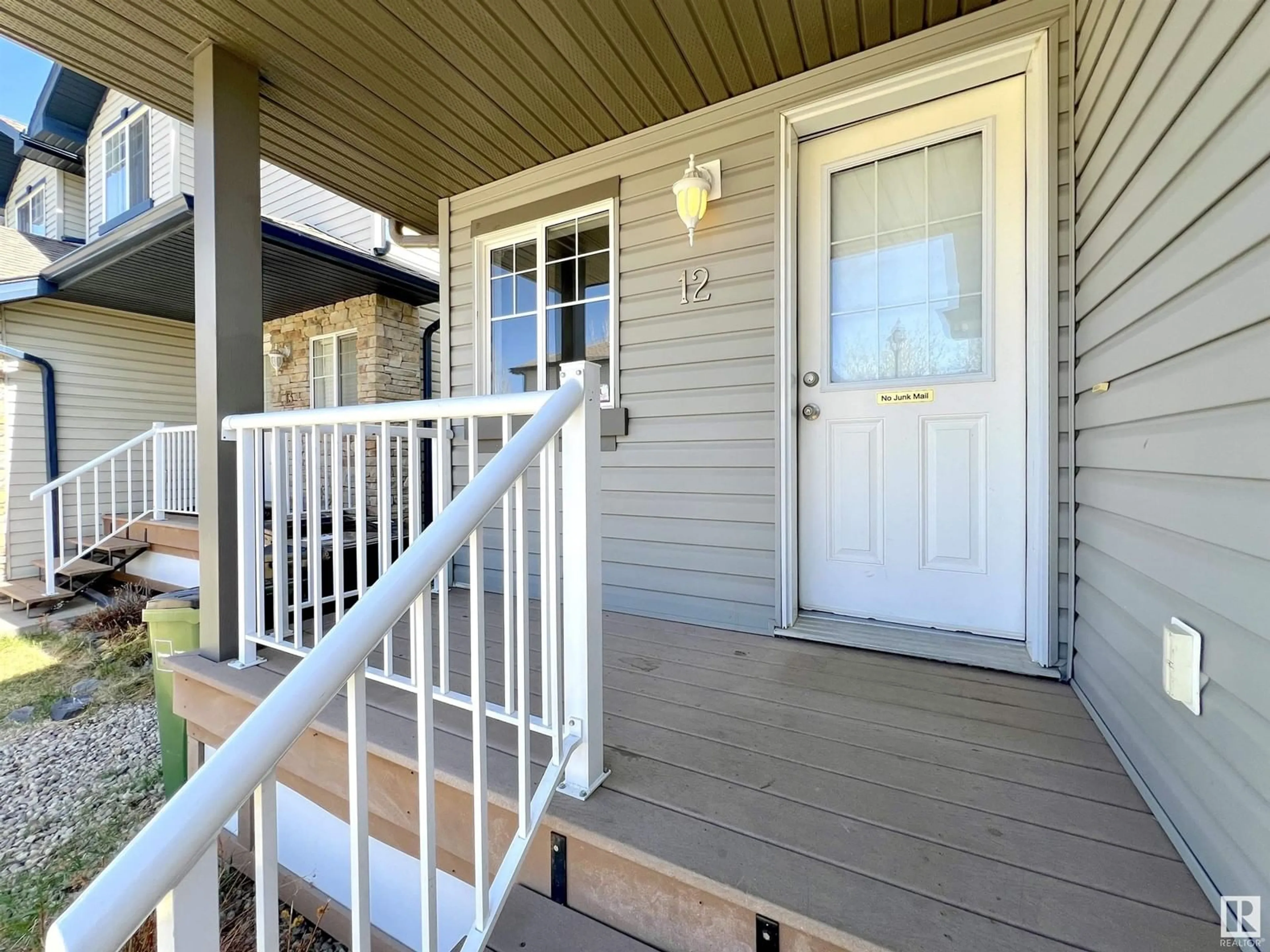 Home with vinyl exterior material, street for #12 - 6304 SANDIN WY, Edmonton Alberta T6R0J8