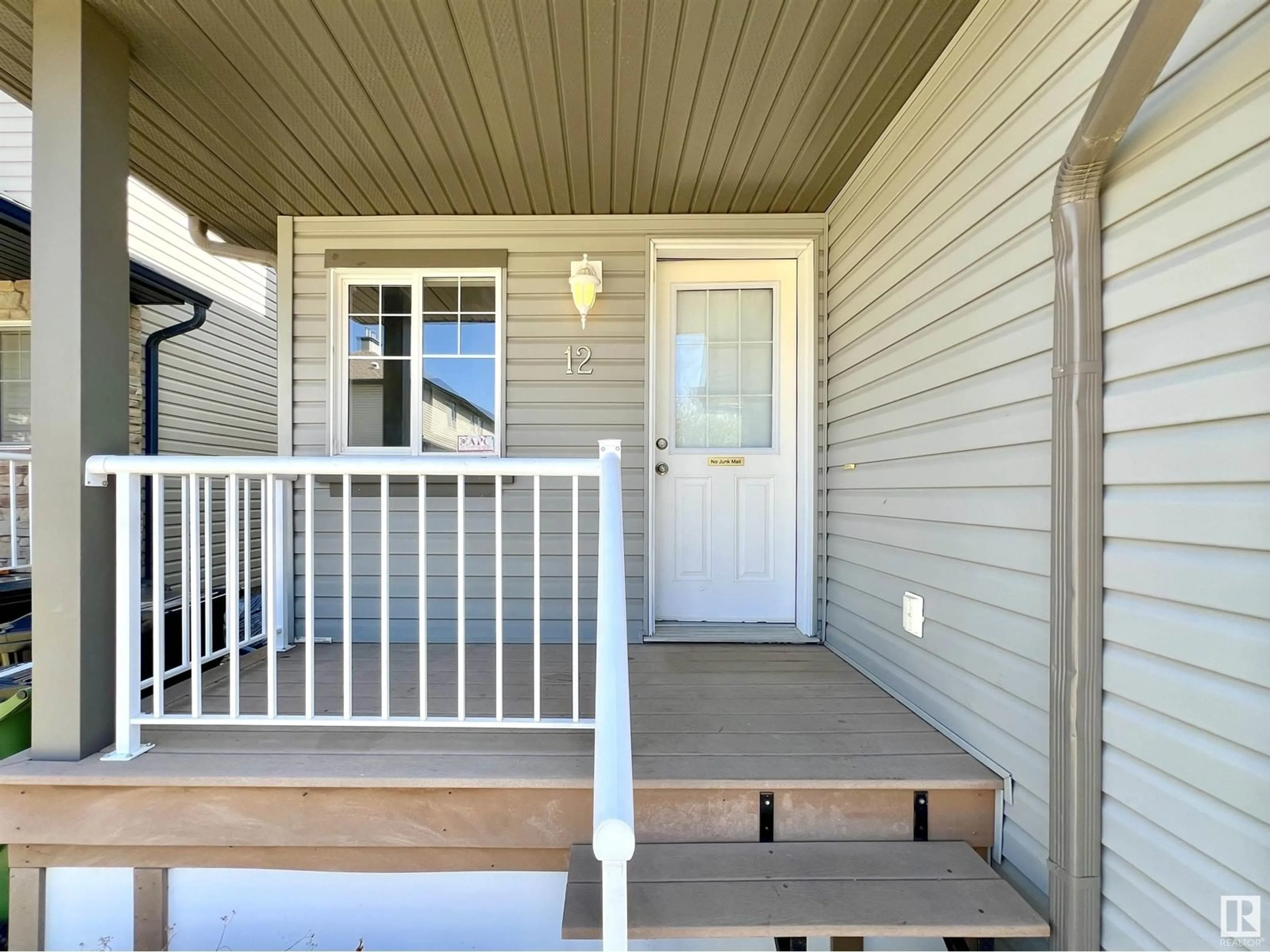 Home with vinyl exterior material, street for #12 - 6304 SANDIN WY, Edmonton Alberta T6R0J8